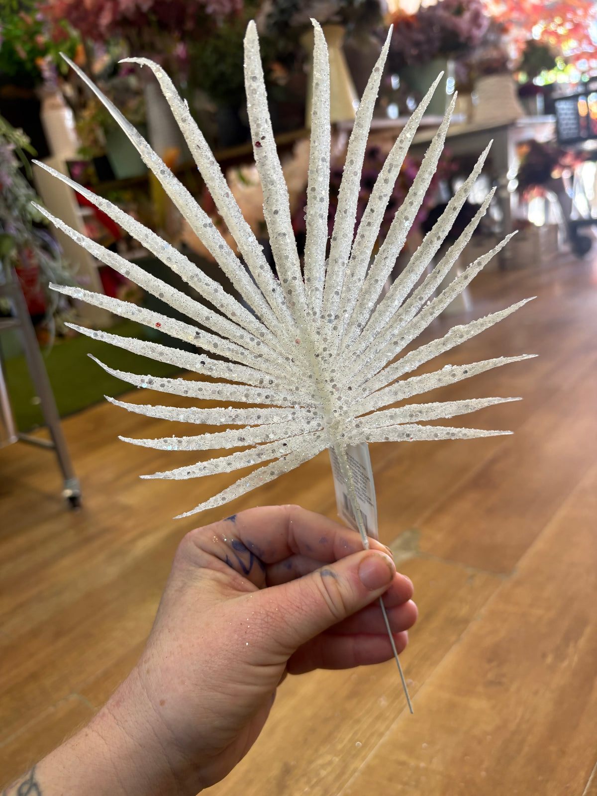 White glittered palm leaf pick