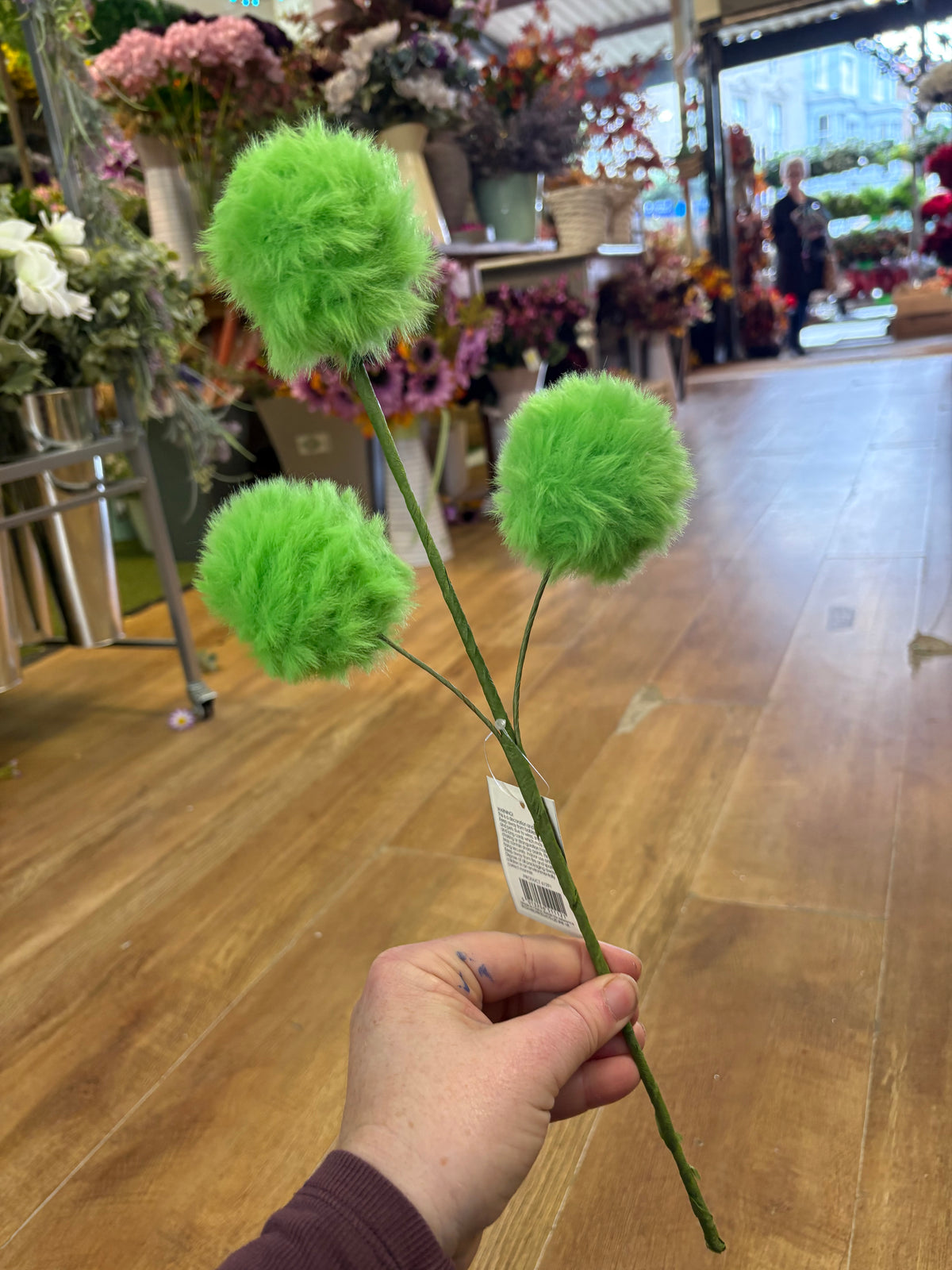 Fluffy green bauble stem