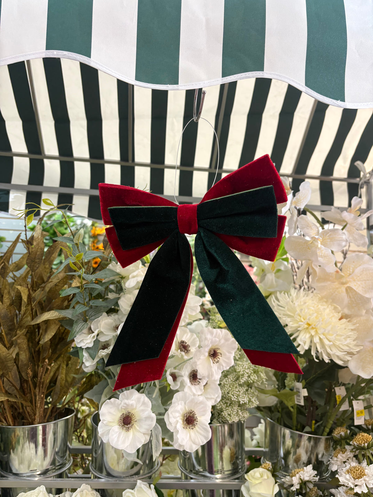 Small red and emerald green velvet Christmas bow