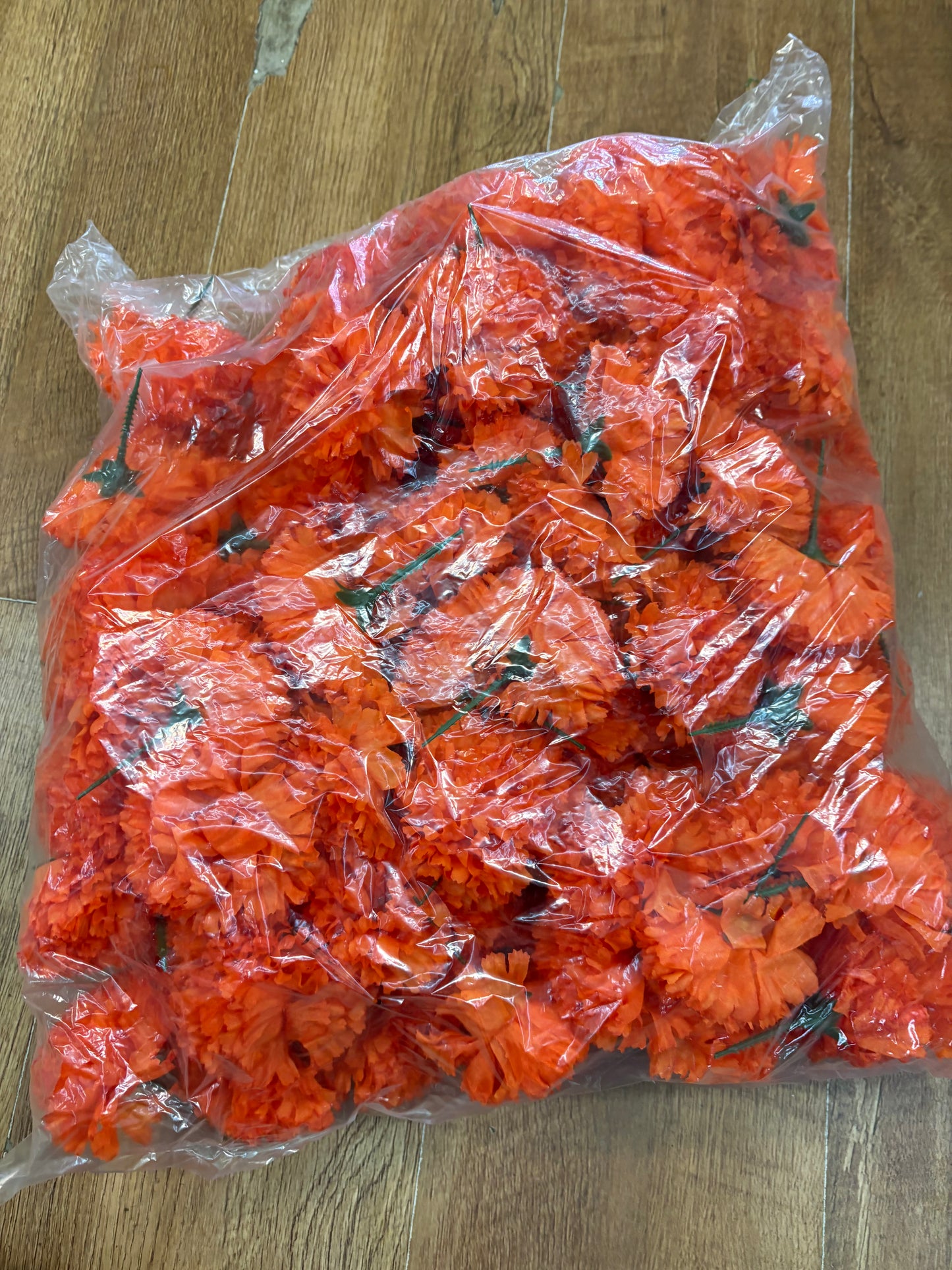 Bag of 144 orange carnation picks