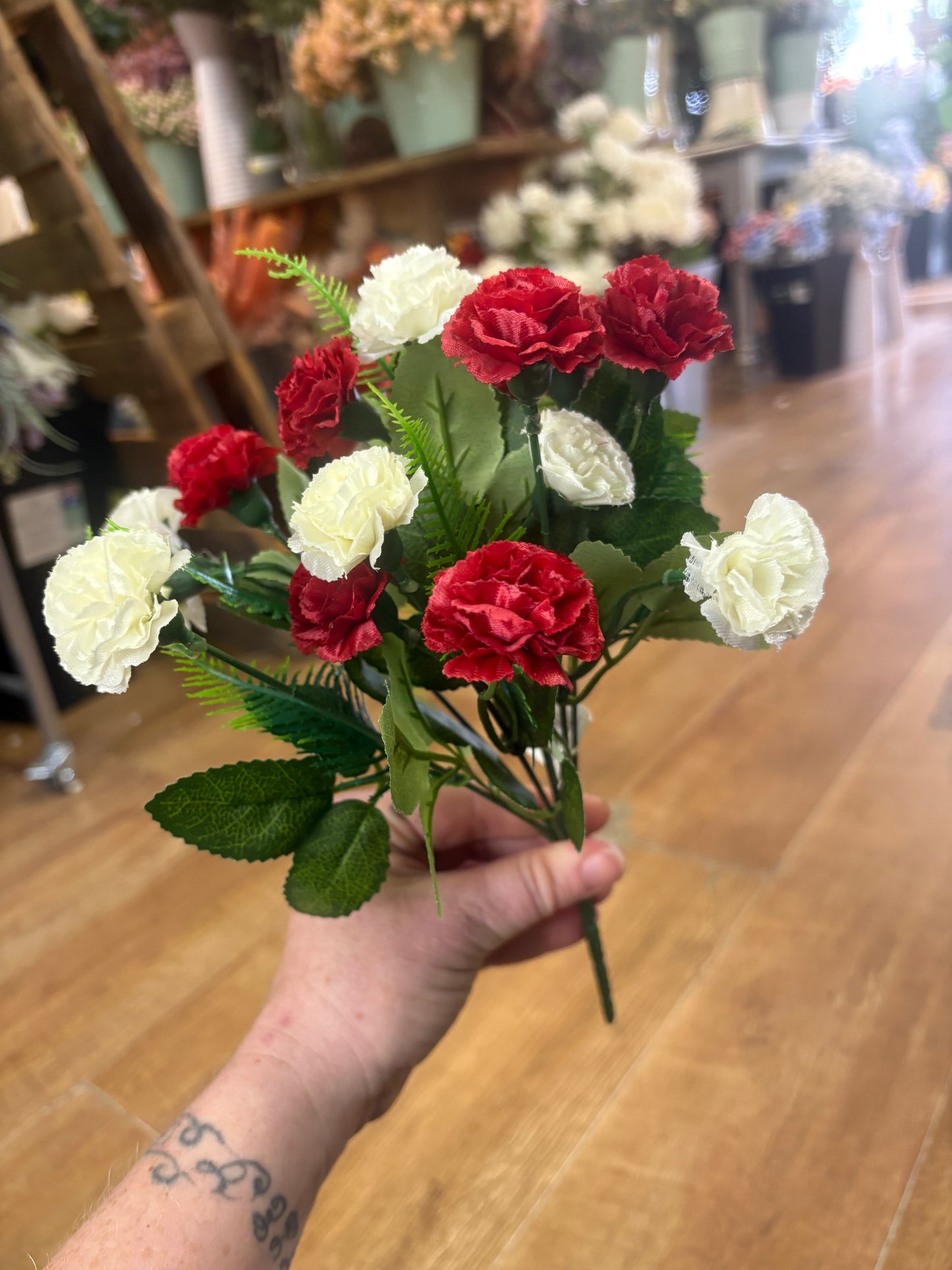 Red and ivory miniature carnation bunch