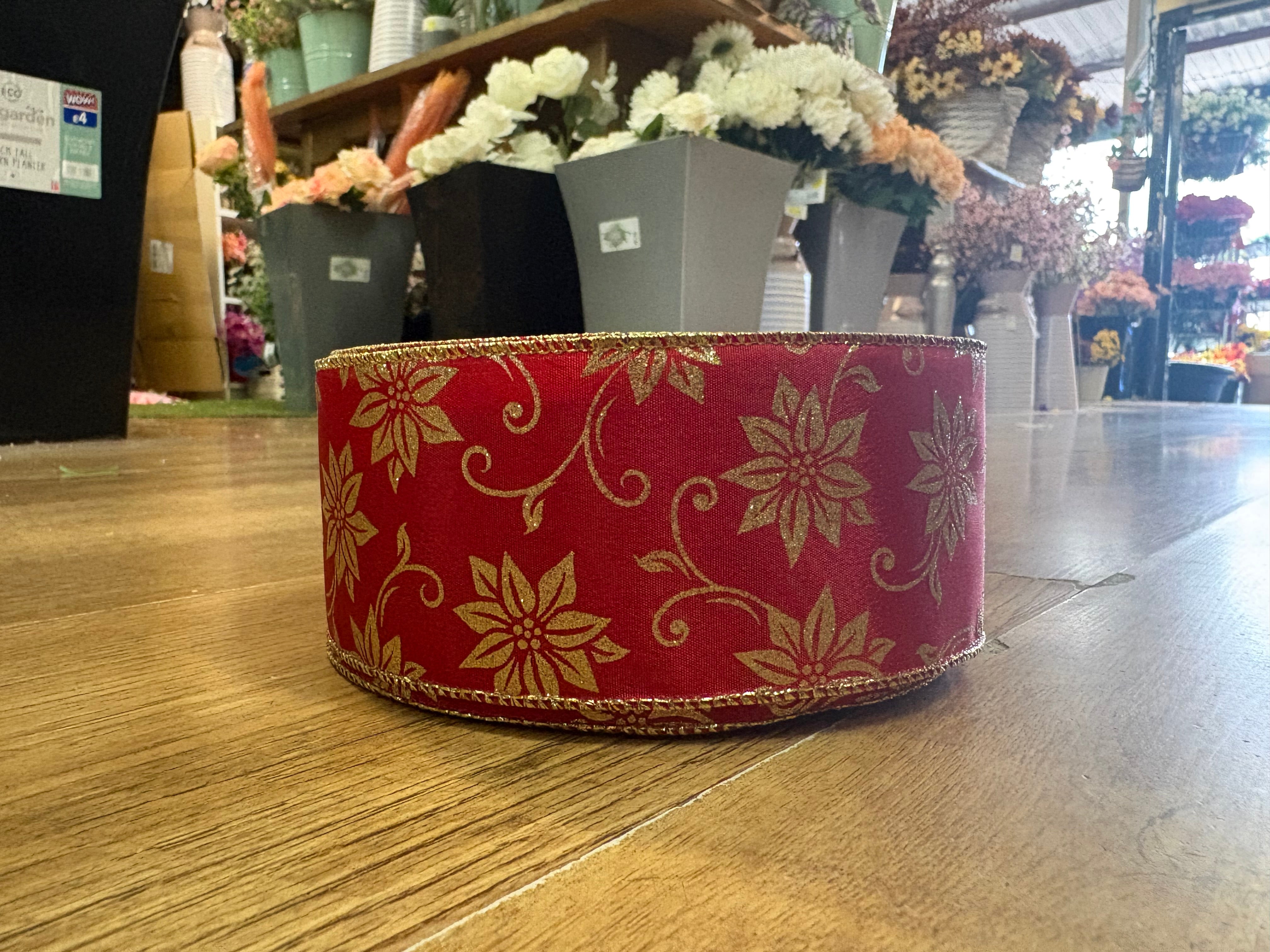 2.5 inch wide red and gold glittered poinsettia wired ribbon - 10 metres