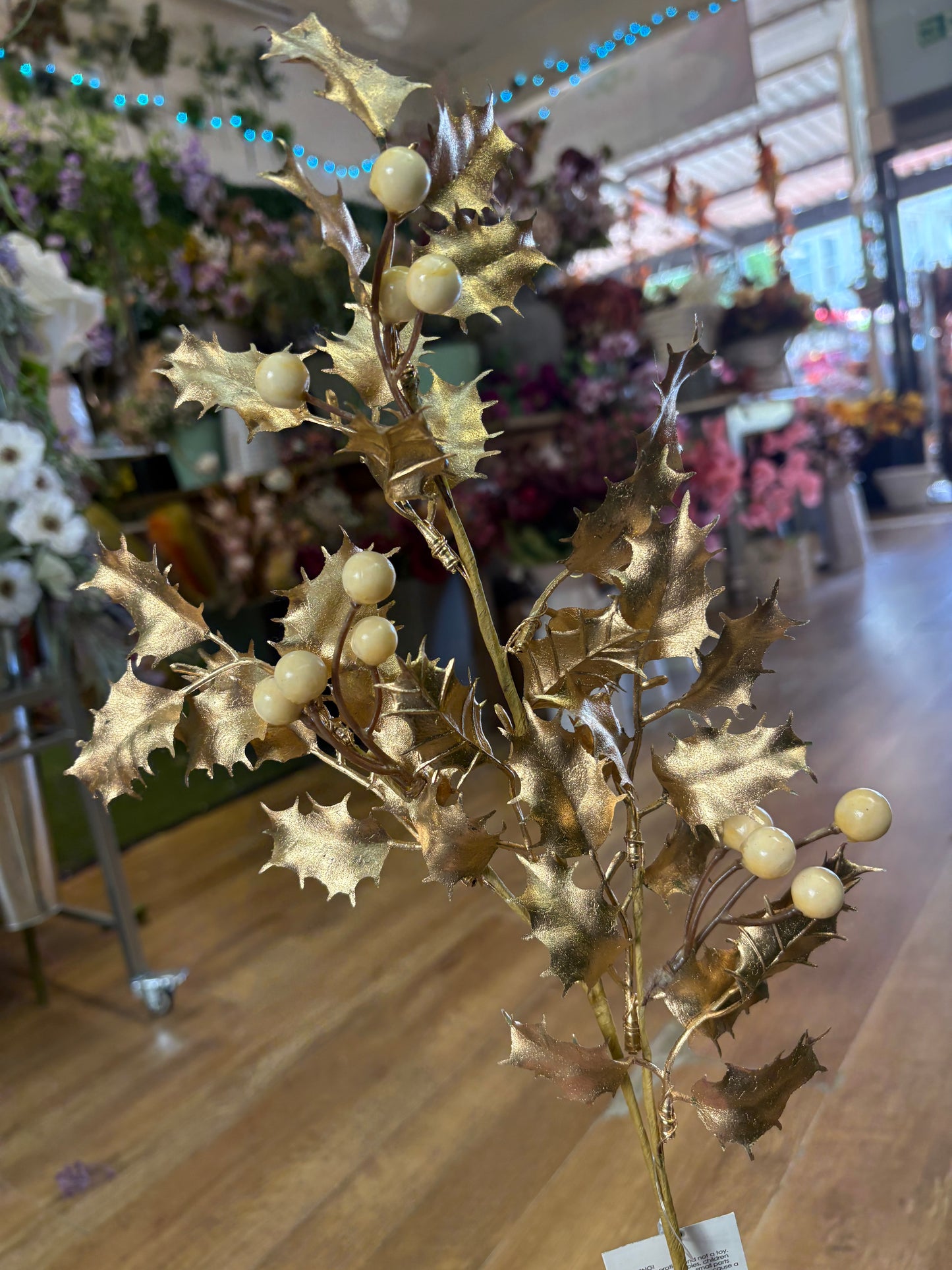 Gold and cream long stem holly spray