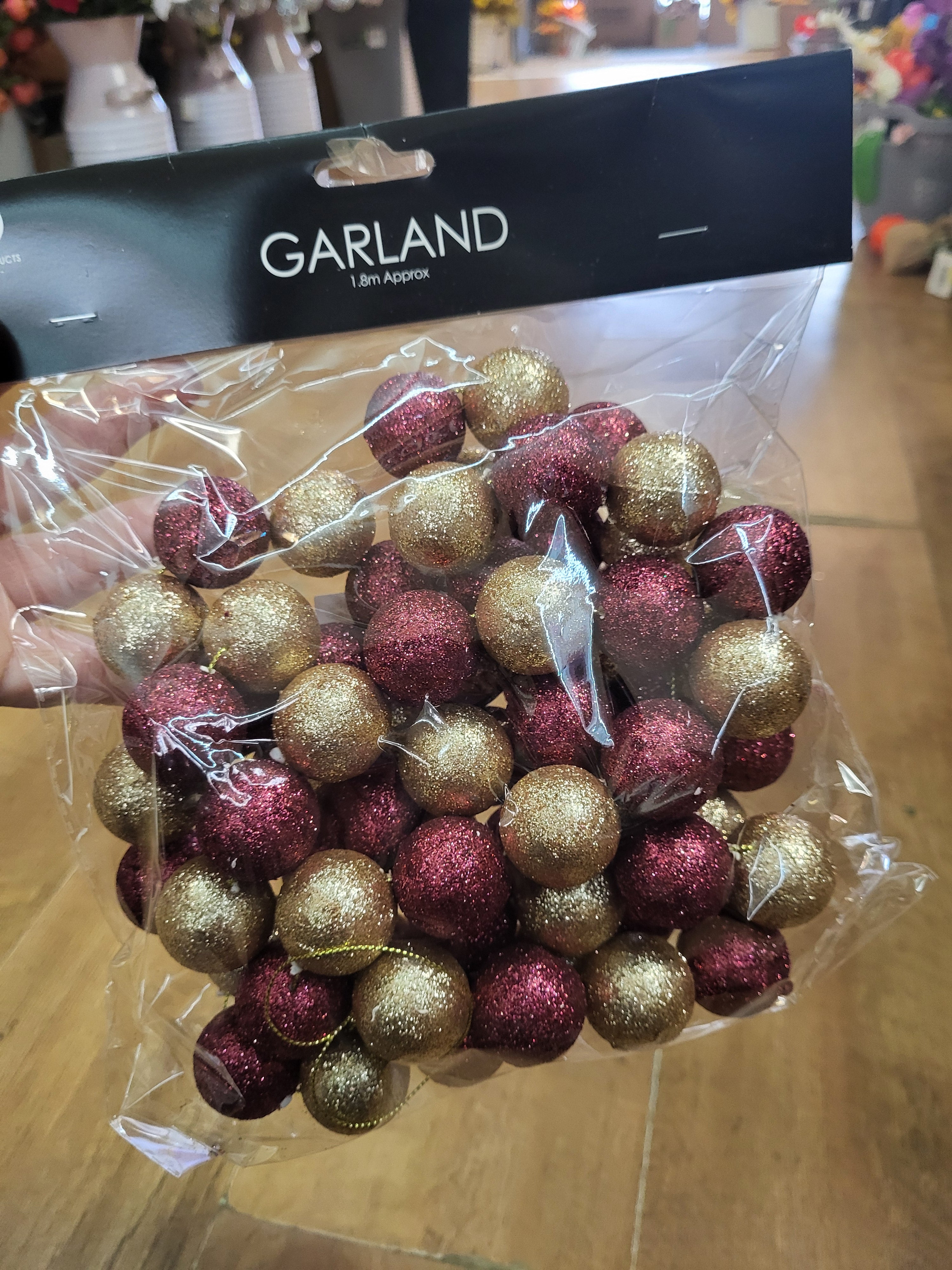 1.8m dark red and champagne gold glitter ball garland image 0