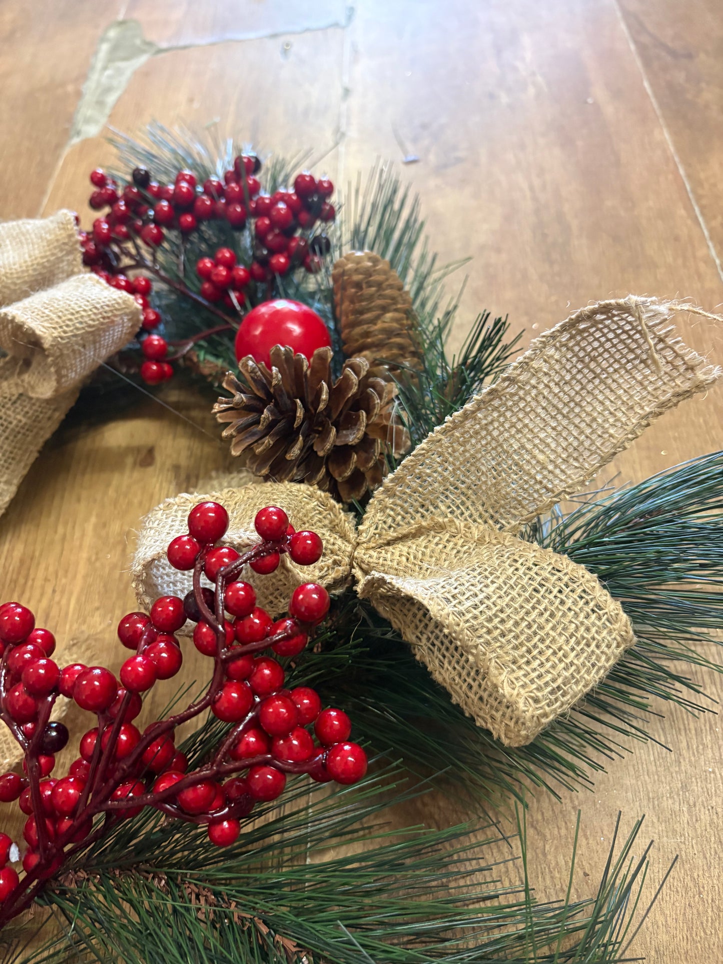 Red berry, cone and bow wreath (40cm from tip to tip)