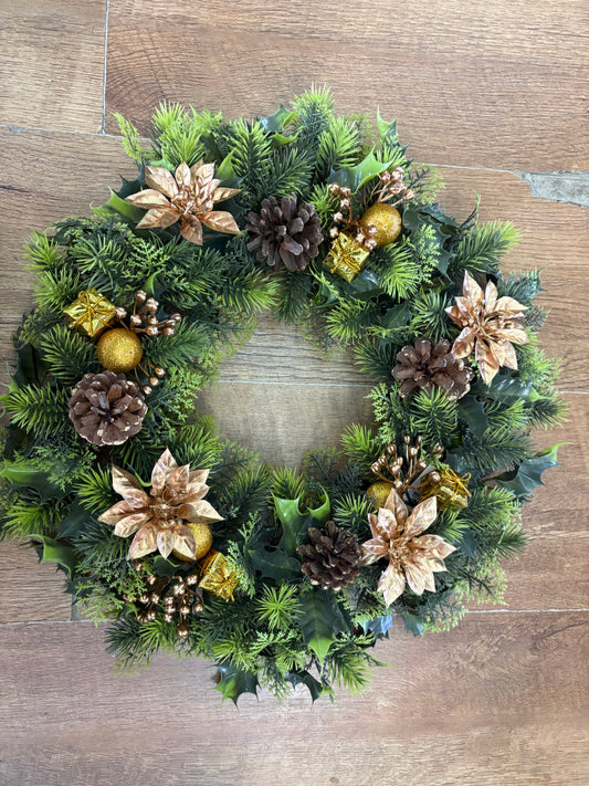 18”  wreath with gold poinsettias, cones, gifts and glitter balls