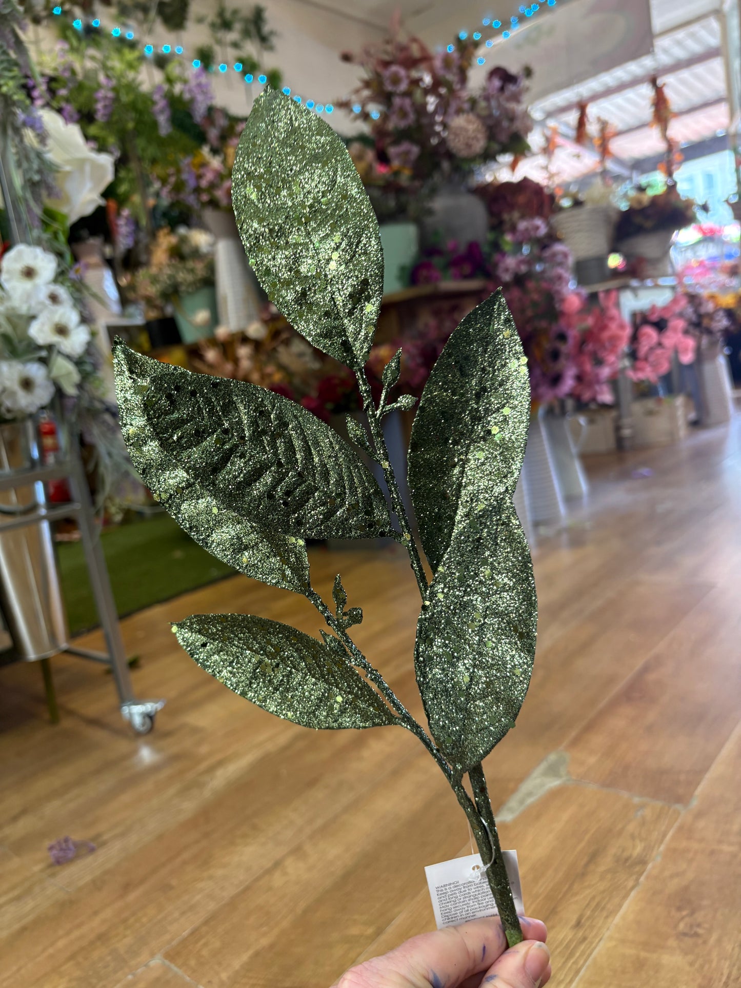 Long stem glittered green foliage spray