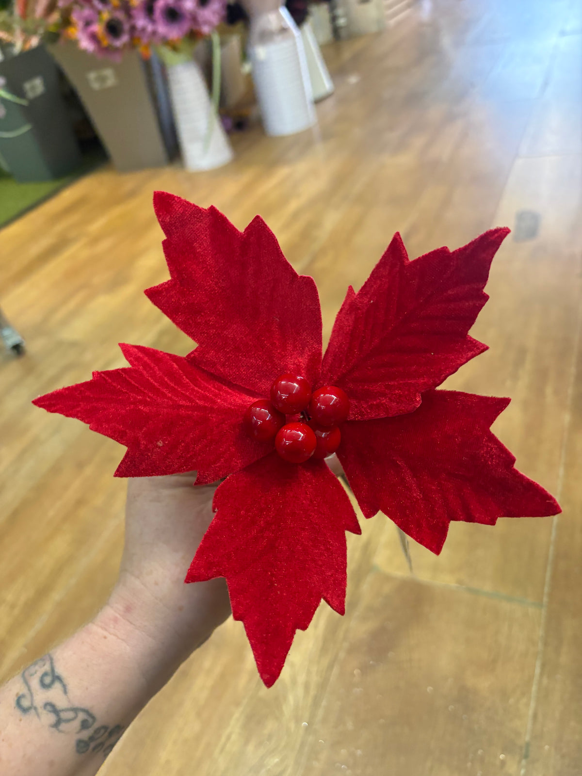 Small red velvet poinsettia pick