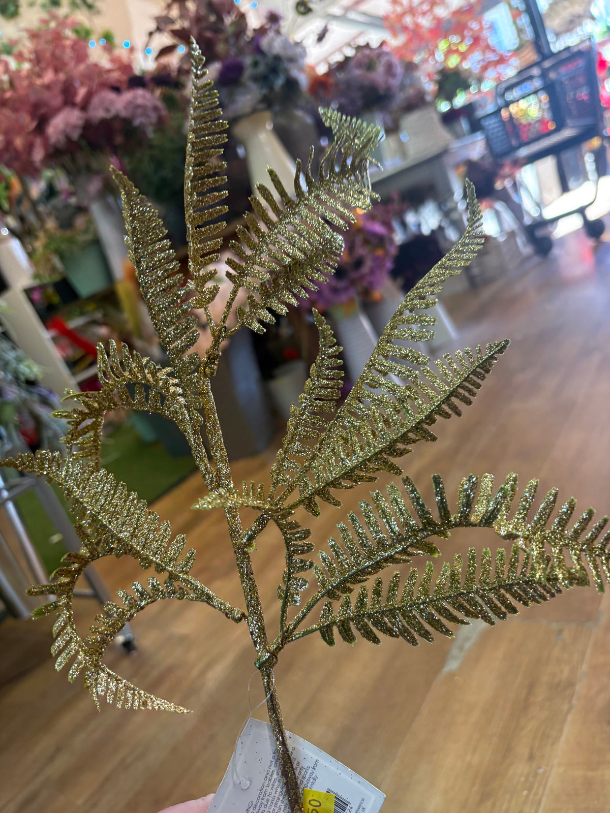 Gold glittered fern stem