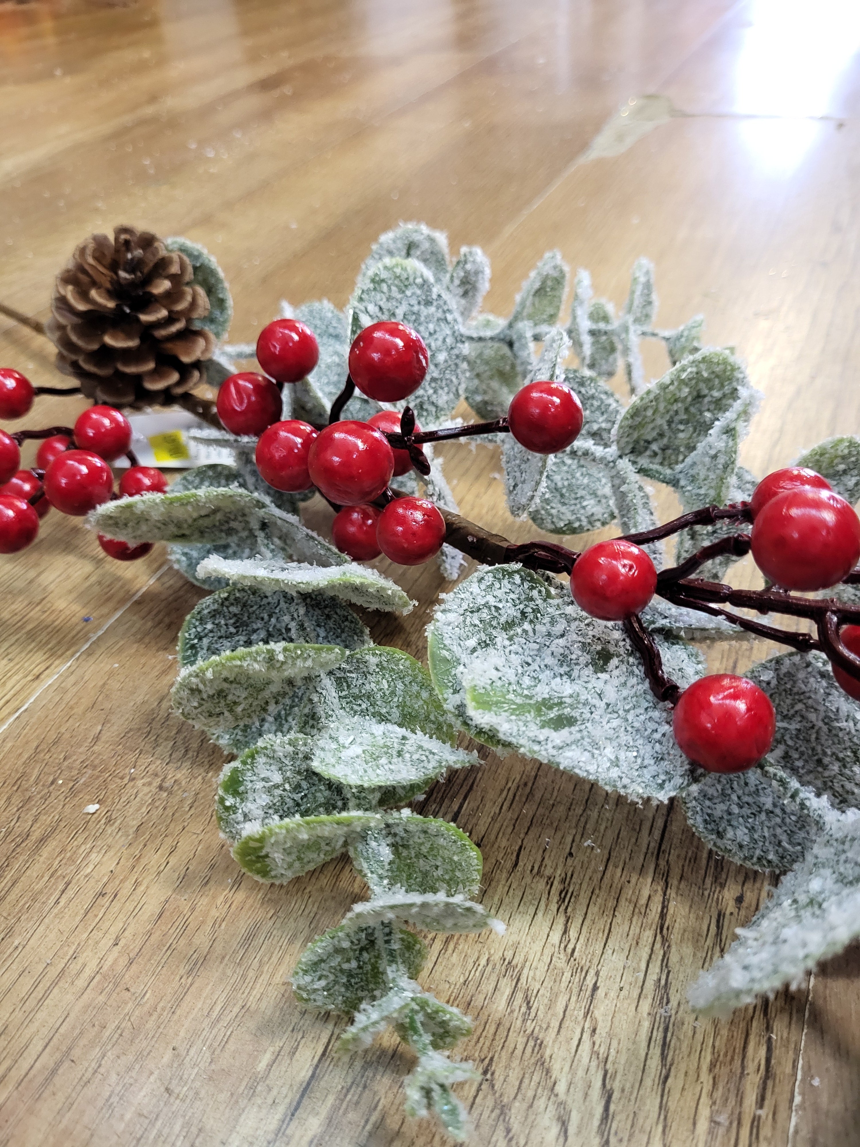 Long stem frosted eucalyptus and red berries winter branch  image 1