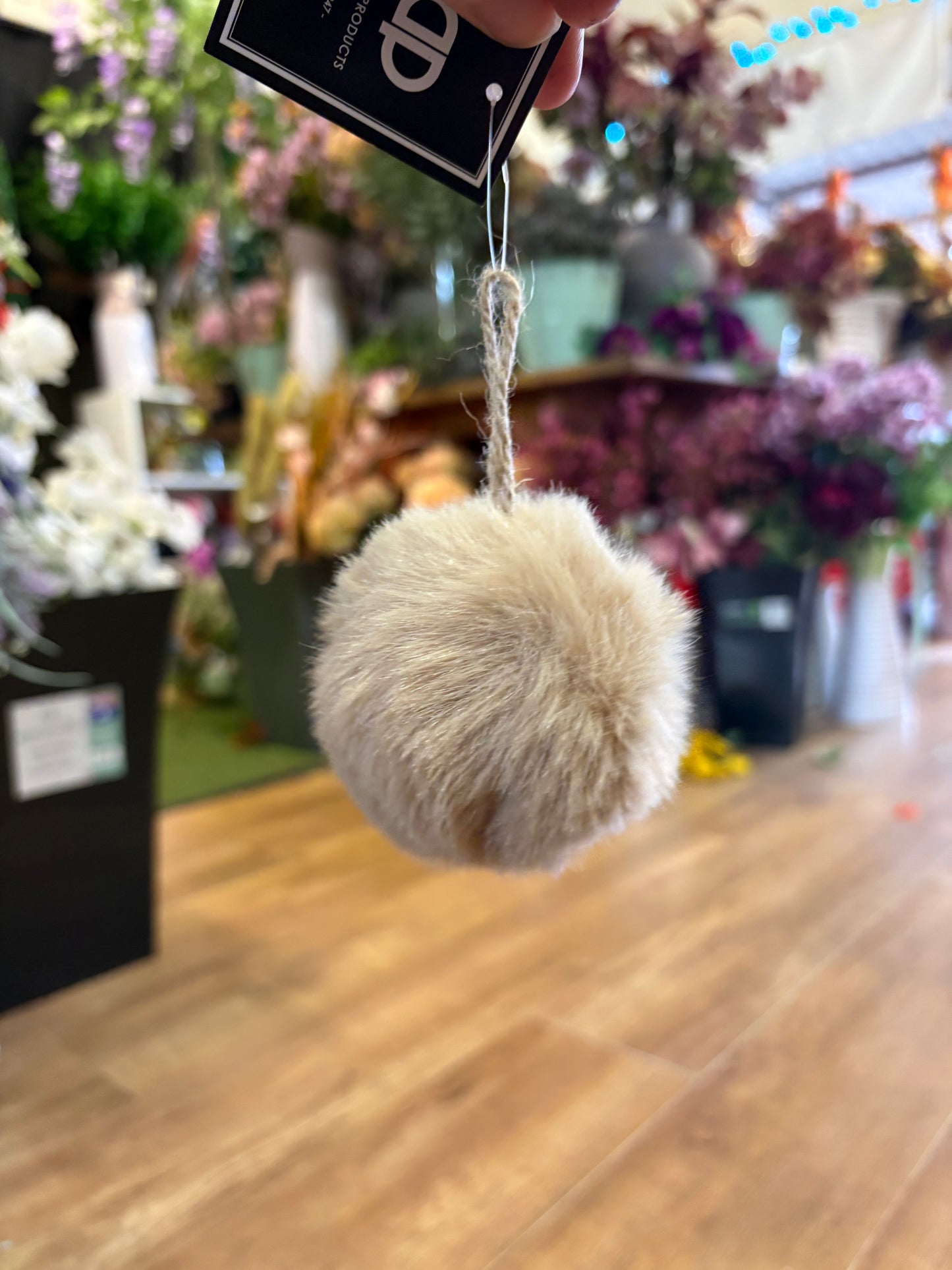 Small beige fluffy bauble