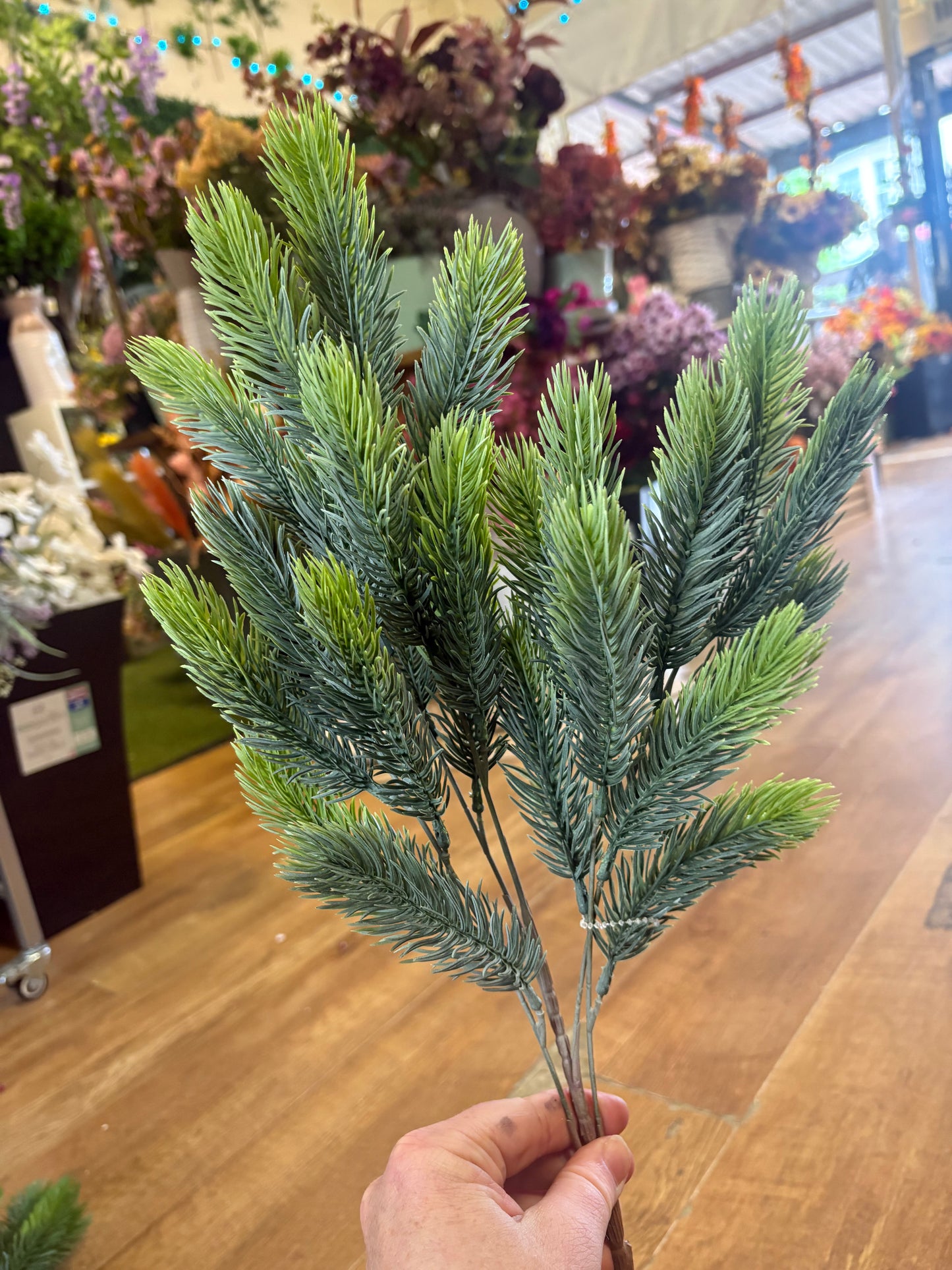 Long stem dusky green winter spruce spray