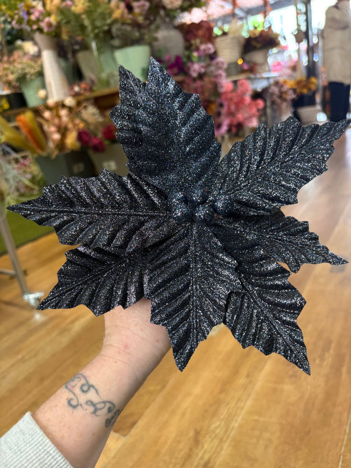 Glittered navy single poinsettia pick