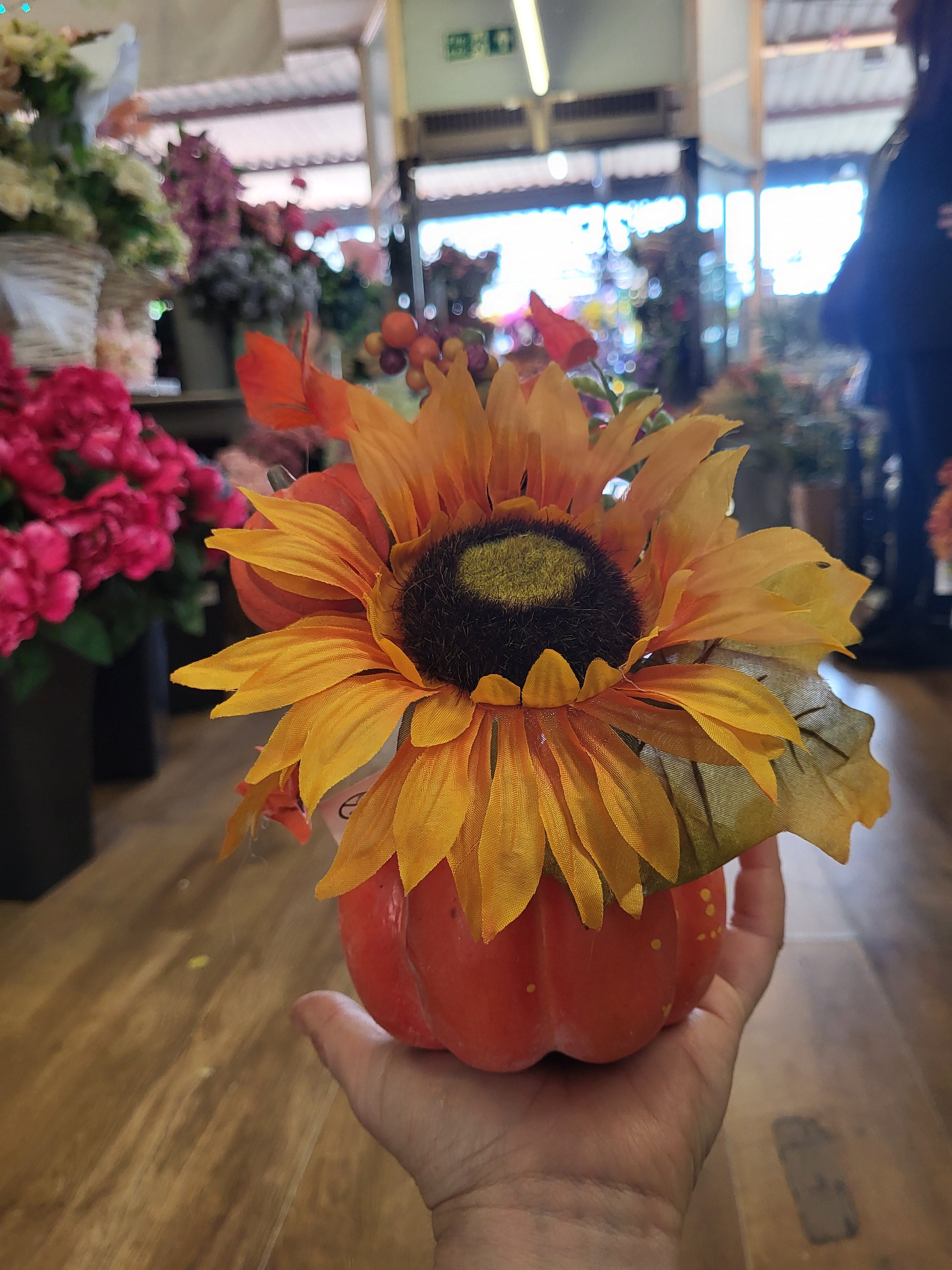 Sunflower/berry/foliage in pumpkin display  image 5