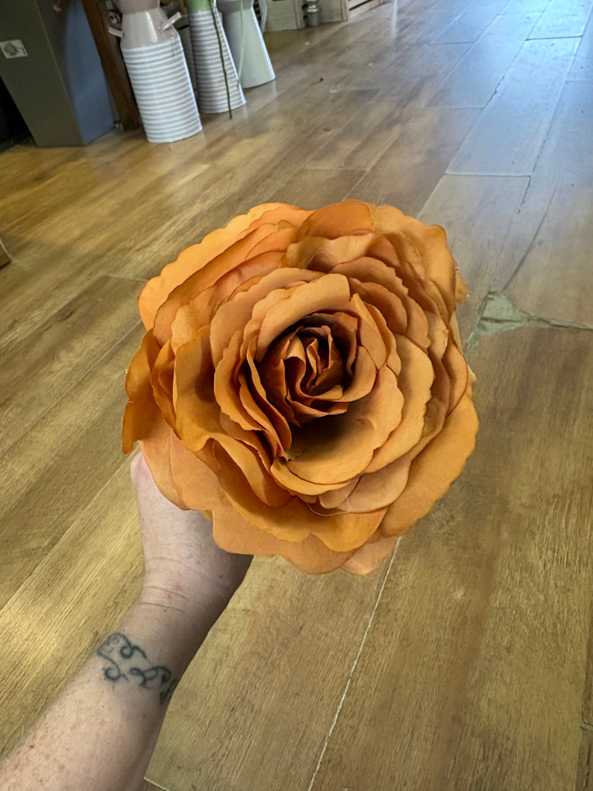 Medium length burnt orange Tudor rose