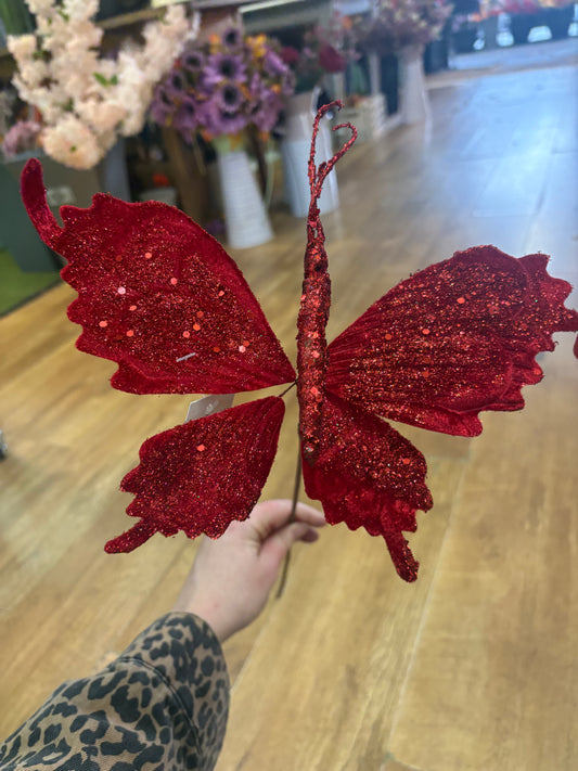 Long stem red velvet and glitter butterfly