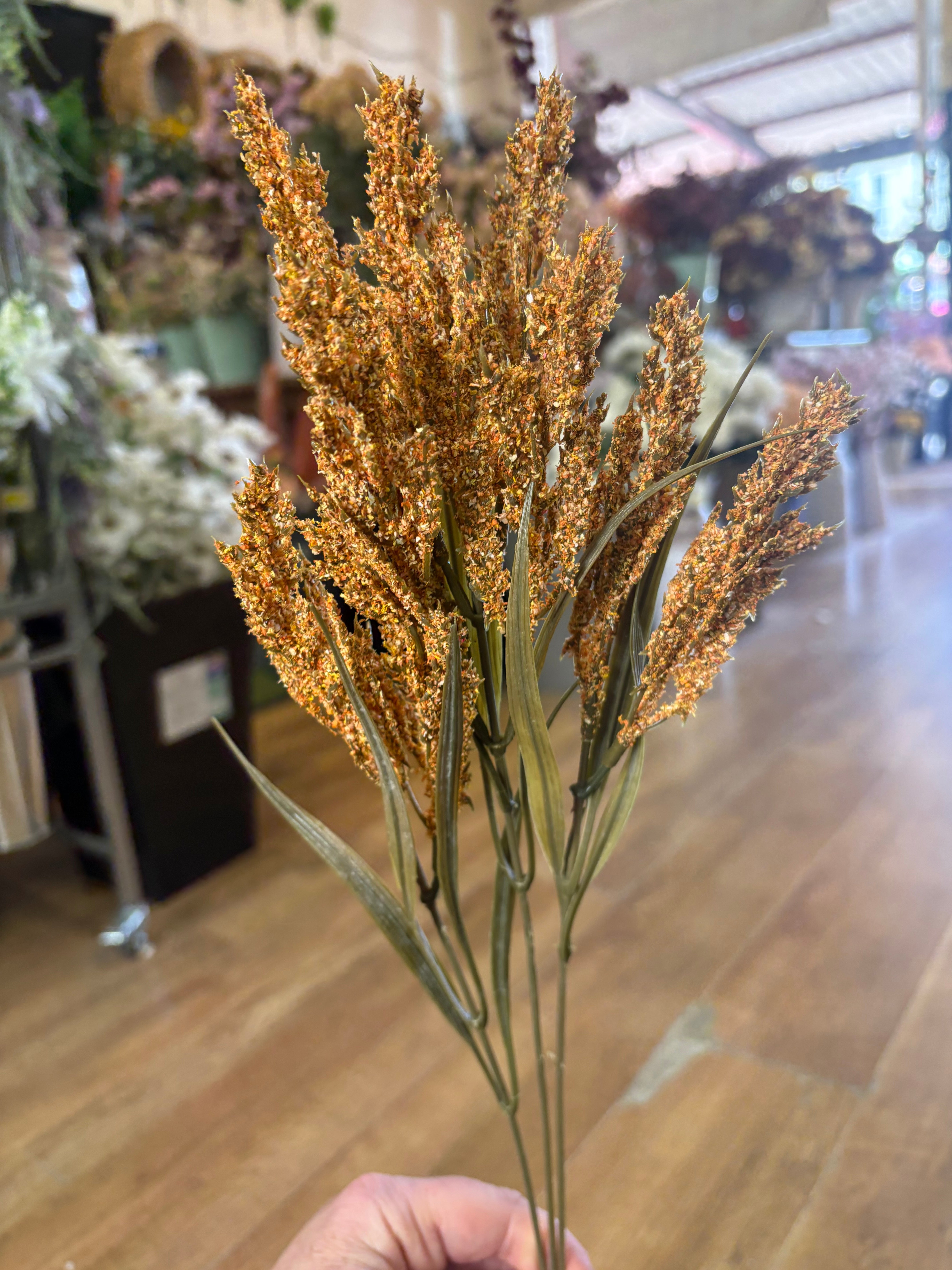 Long stem orange autumn heather spray