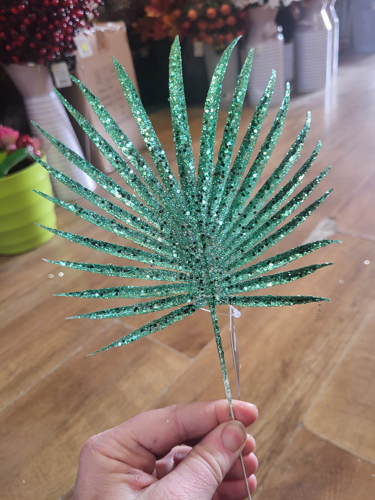Green glittered palm leaf pick image 0