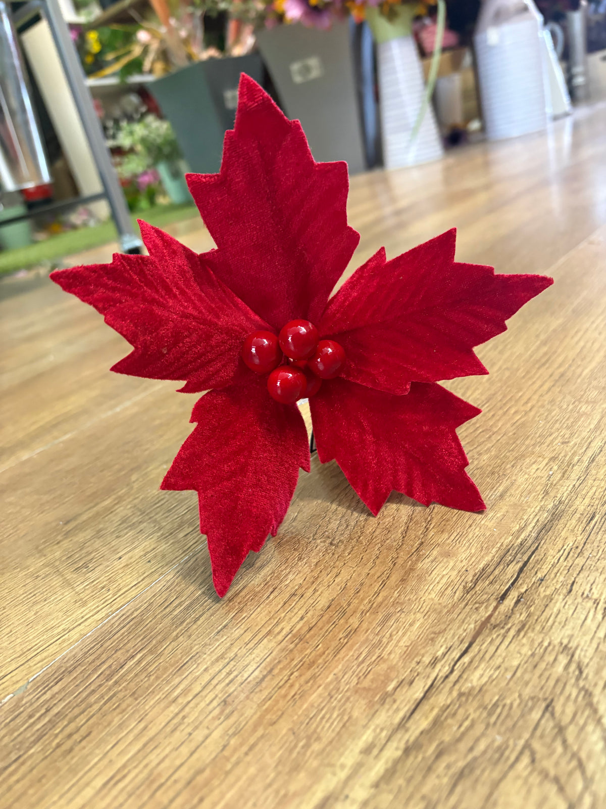 Small red velvet poinsettia pick