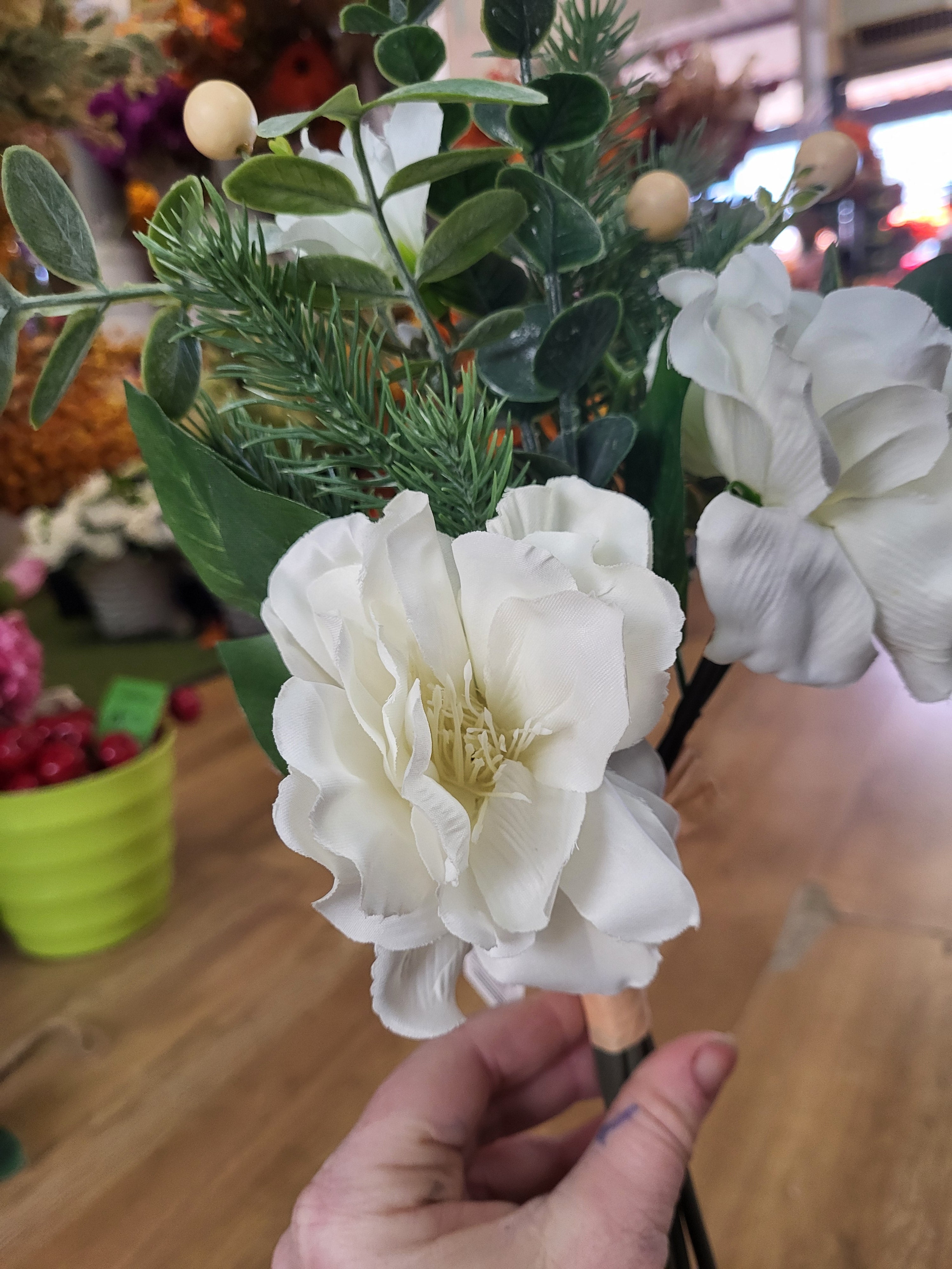Hand tied winter foliage bundle with ivory flowers and cream berries image 6