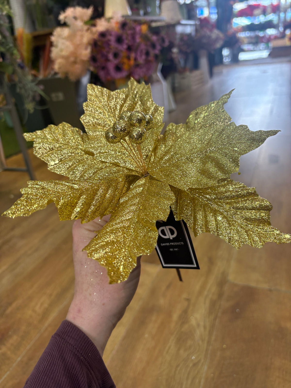 Short gold glittered poinsettia