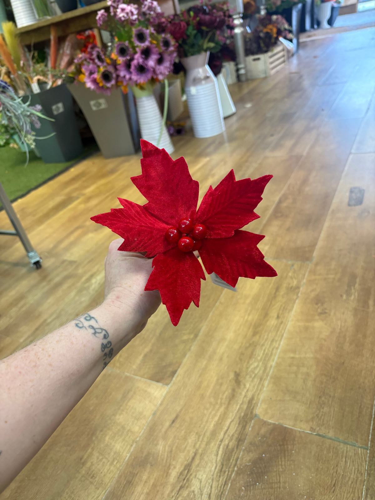 Small red velvet poinsettia pick