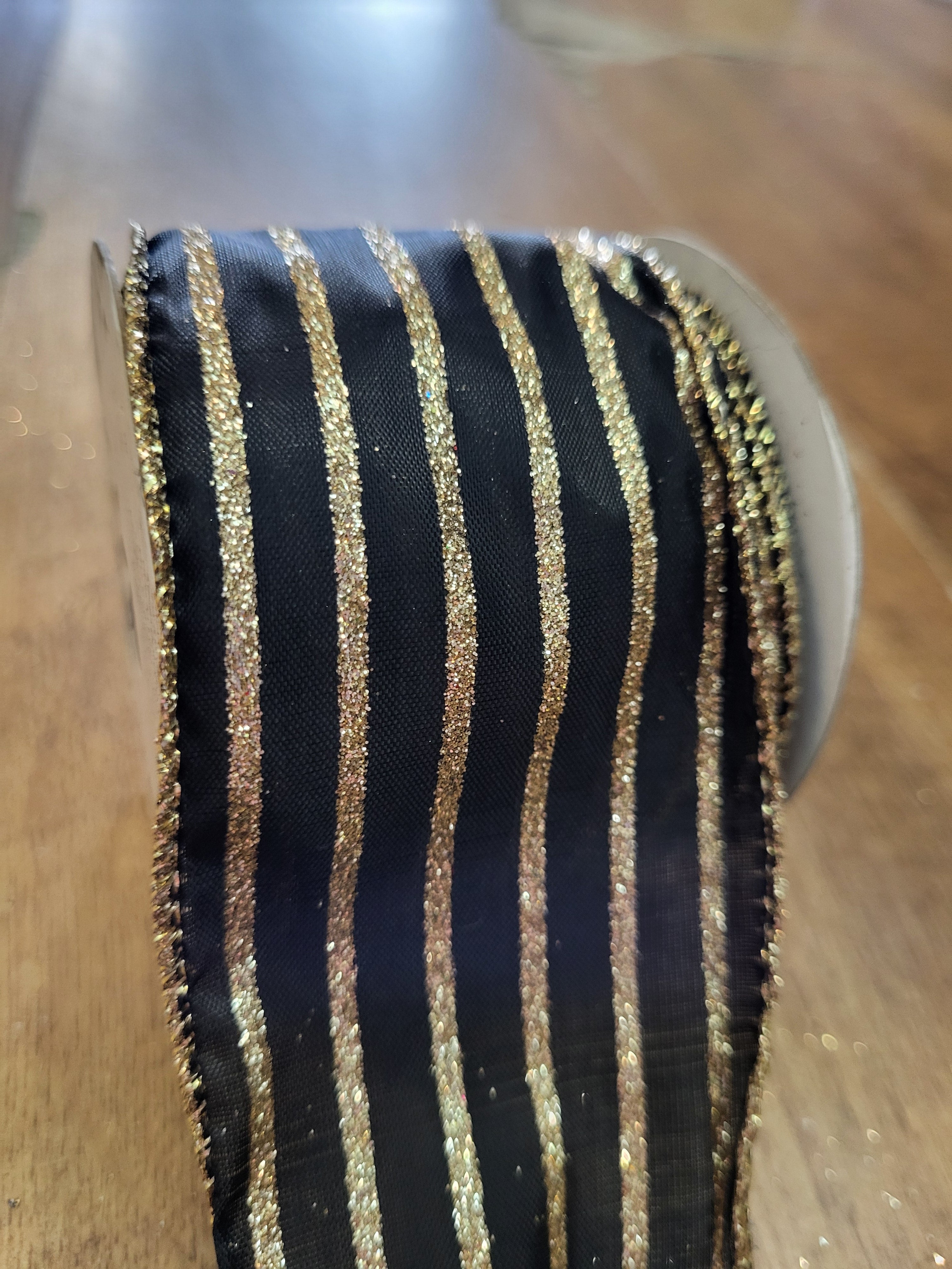 2.7m approx. roll of black with gold glitter striped wired ribbon image 2