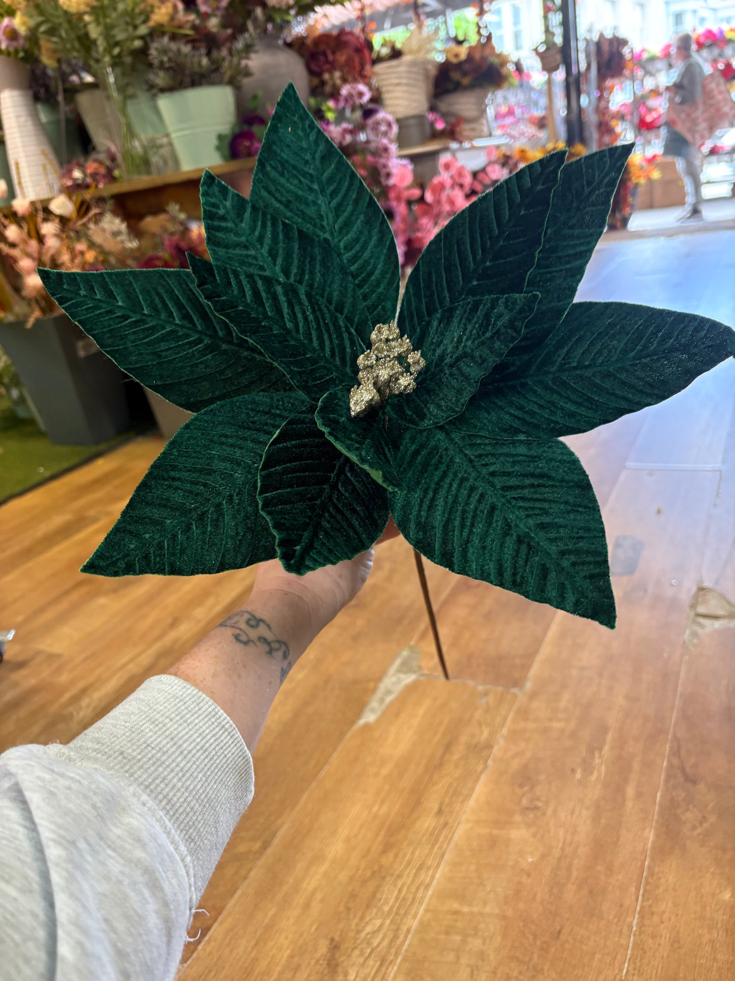 Large emerald green velvet single poinsettia