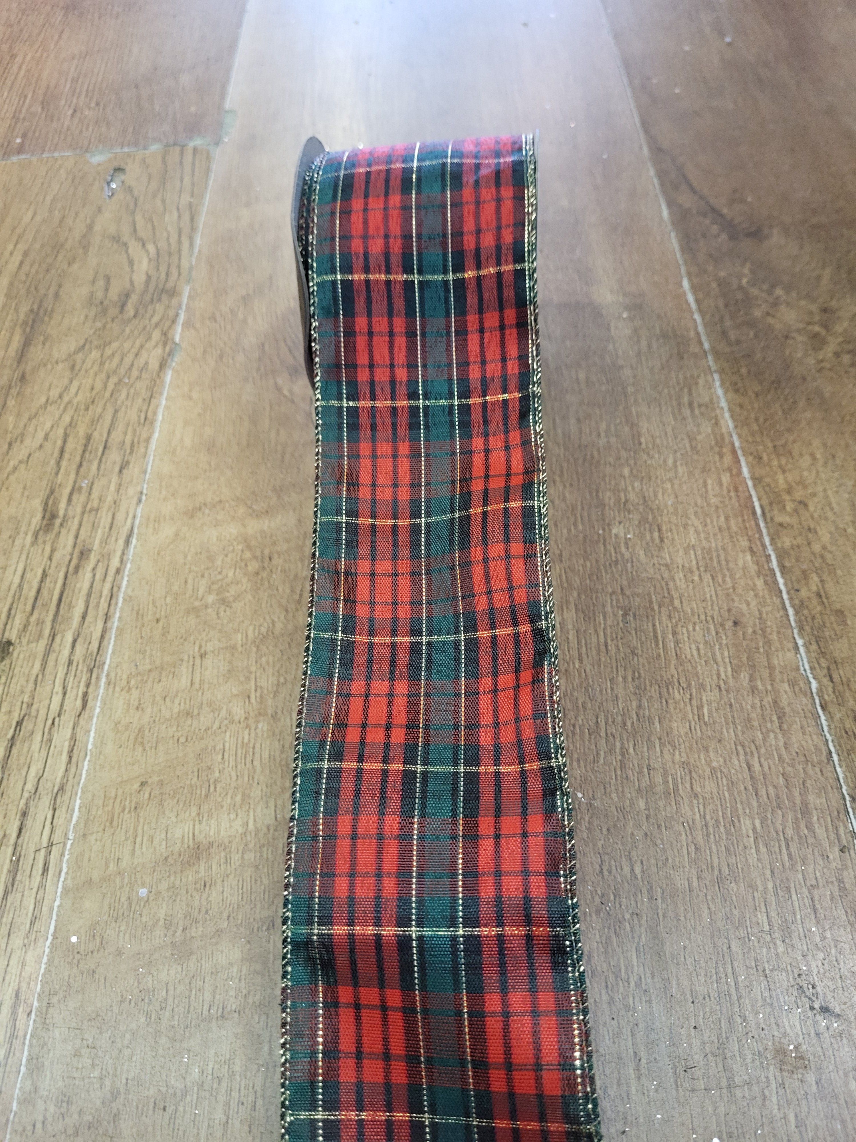 2.7m approx. roll of dark green/red tartan wired ribbon image 0