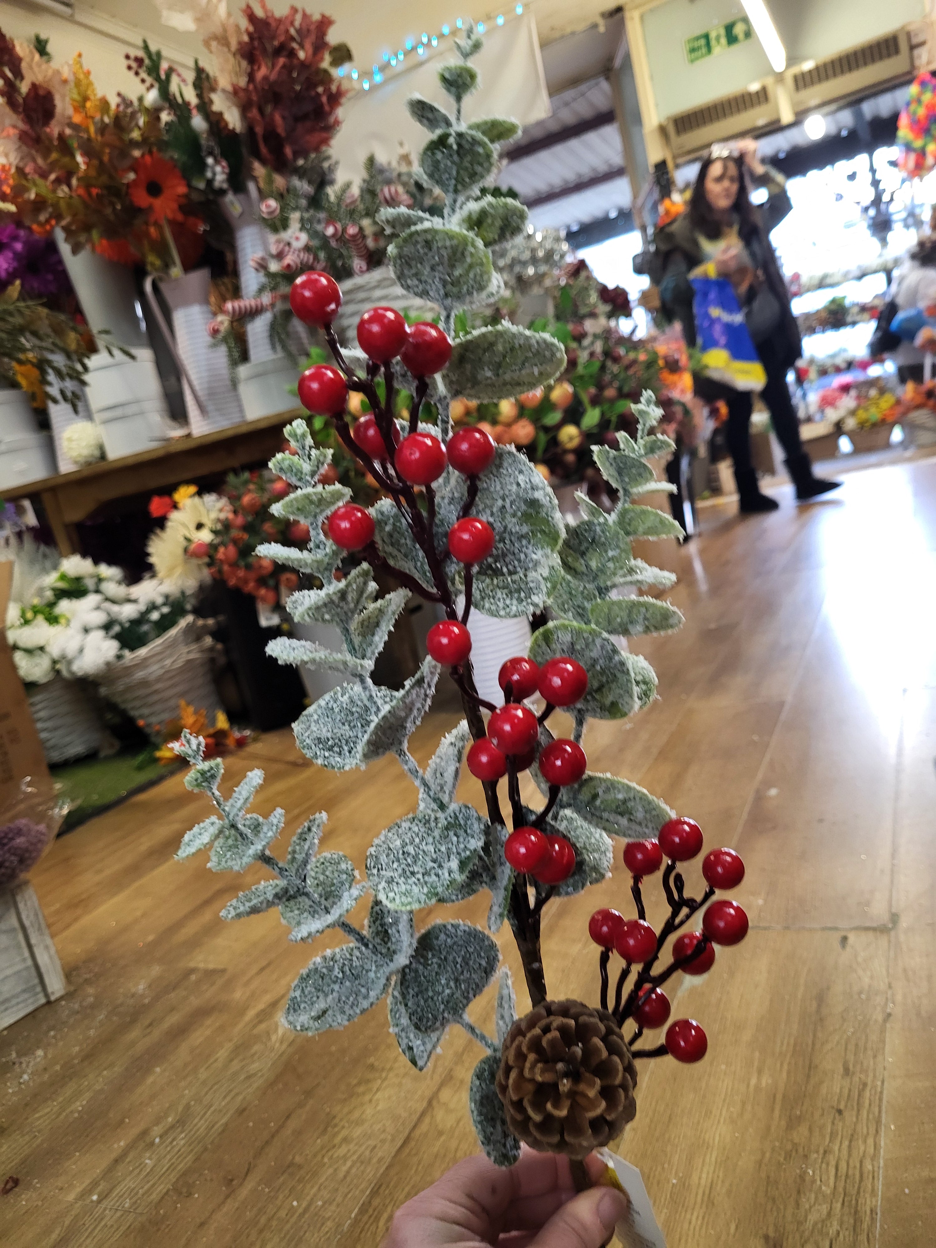Long stem frosted eucalyptus and red berries winter branch  image 2