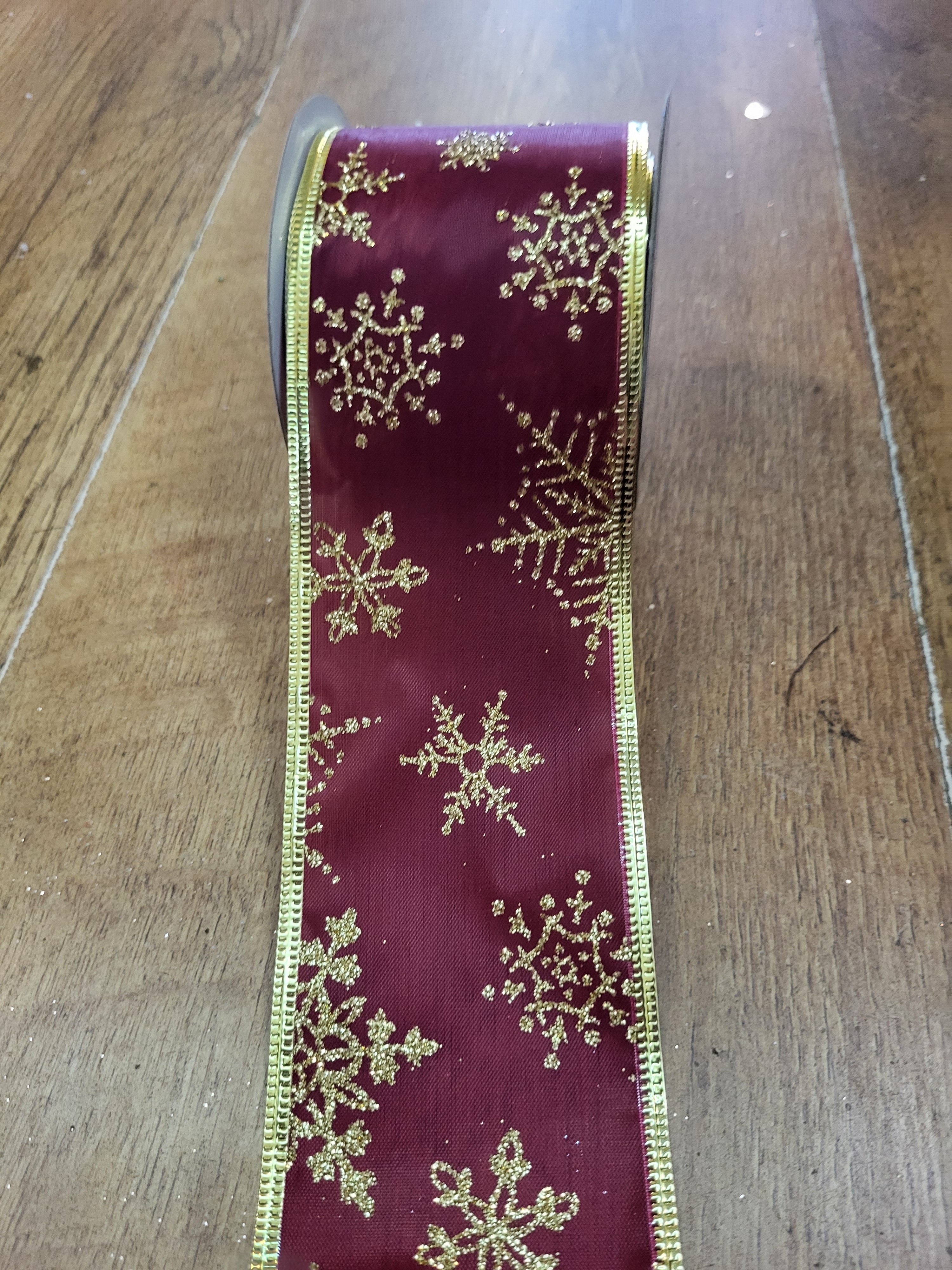 2.7m approx. roll of dark red/gold glitter snowflake wired ribbon image 0