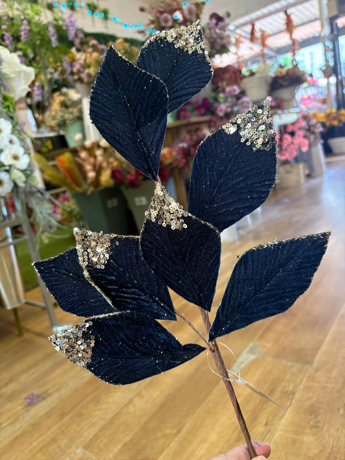 Long stem navy velvet and champagne gold foliage spray