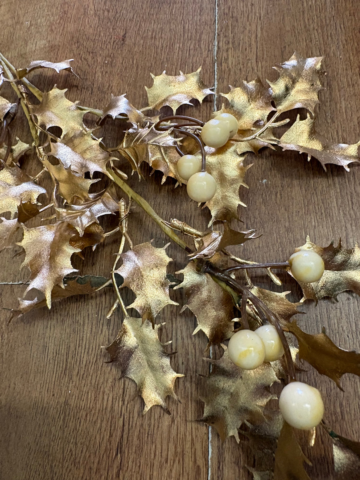 Gold and cream long stem holly spray