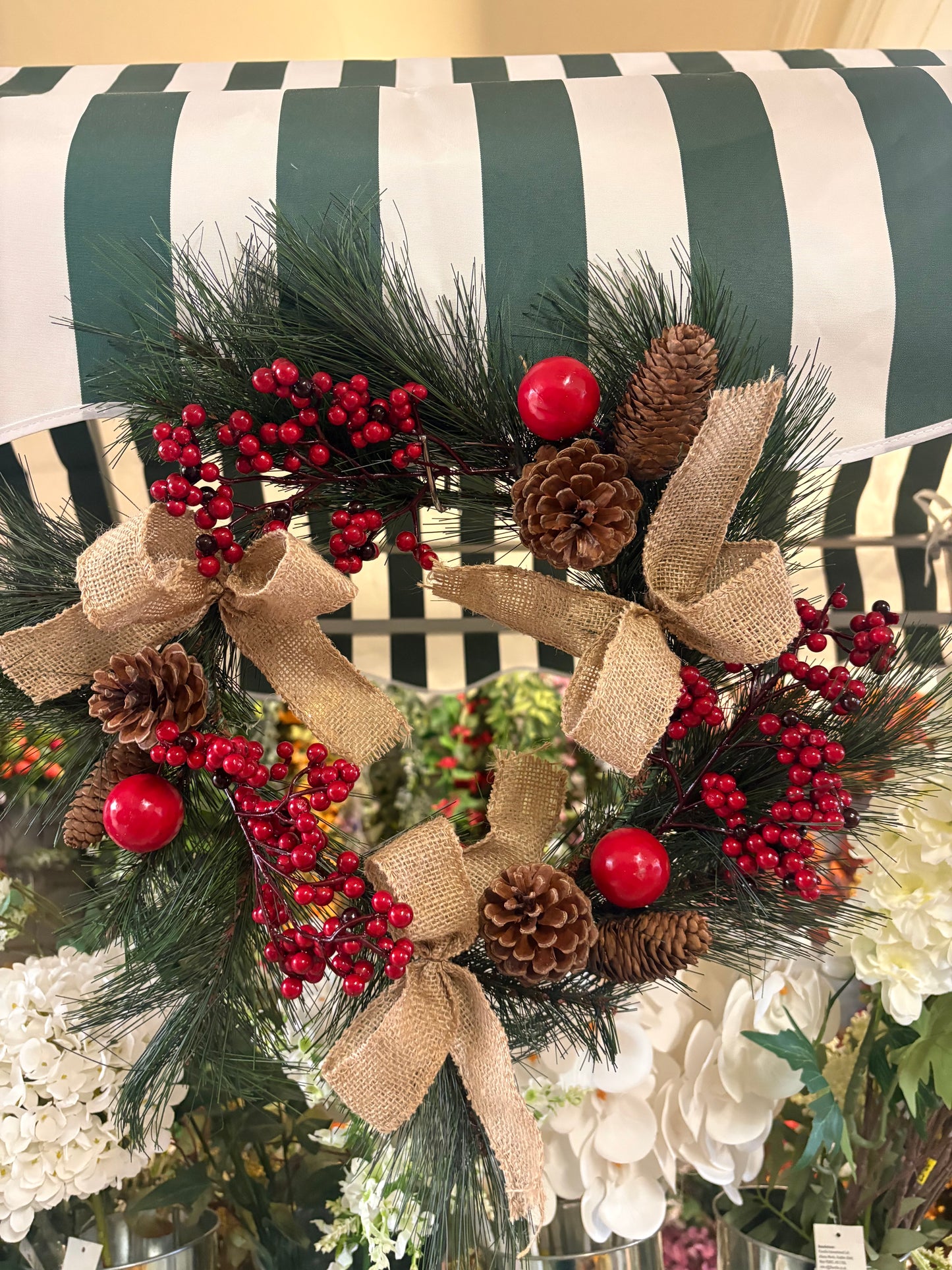 Red berry, cone and bow wreath (40cm from tip to tip)