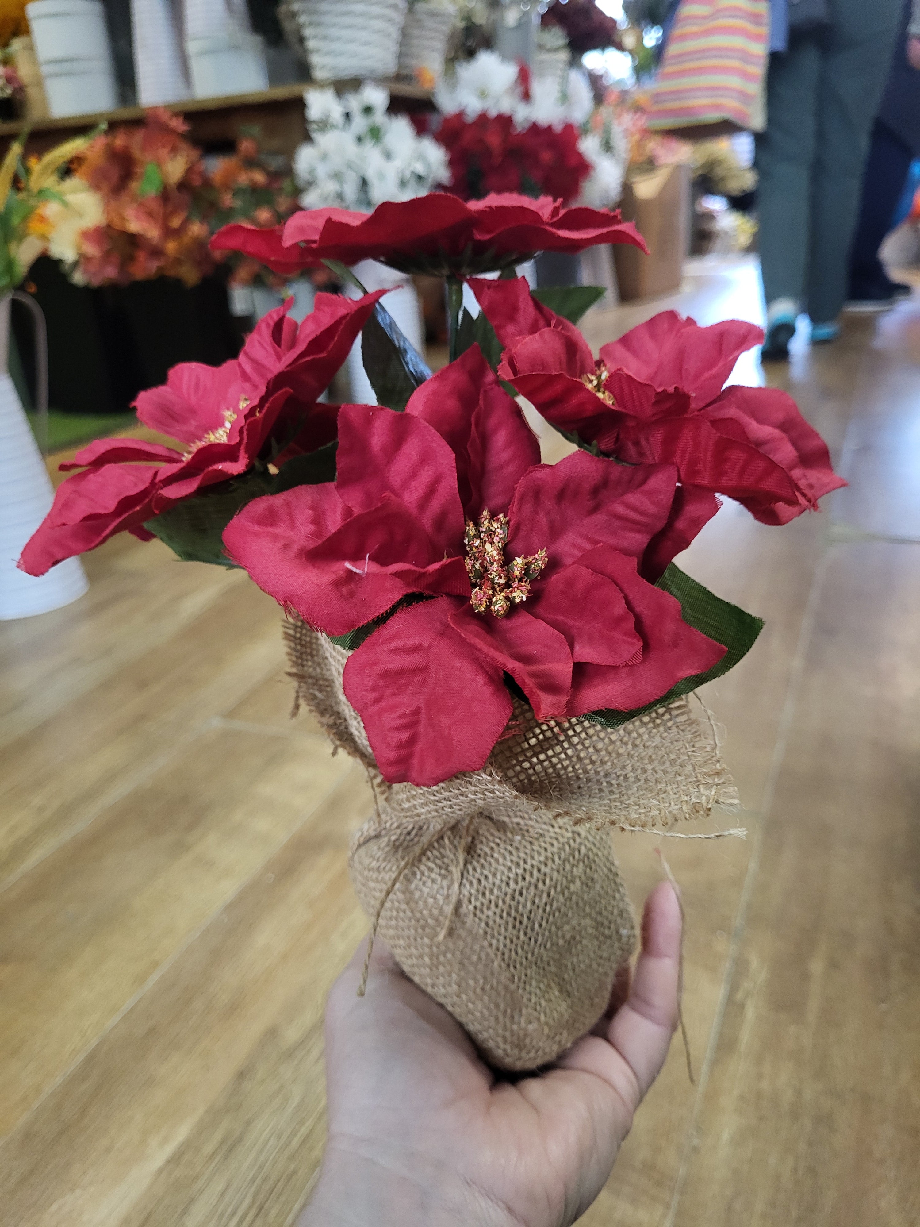 28cm poinsettia wrapped in burlap  - 2 colours available image 6