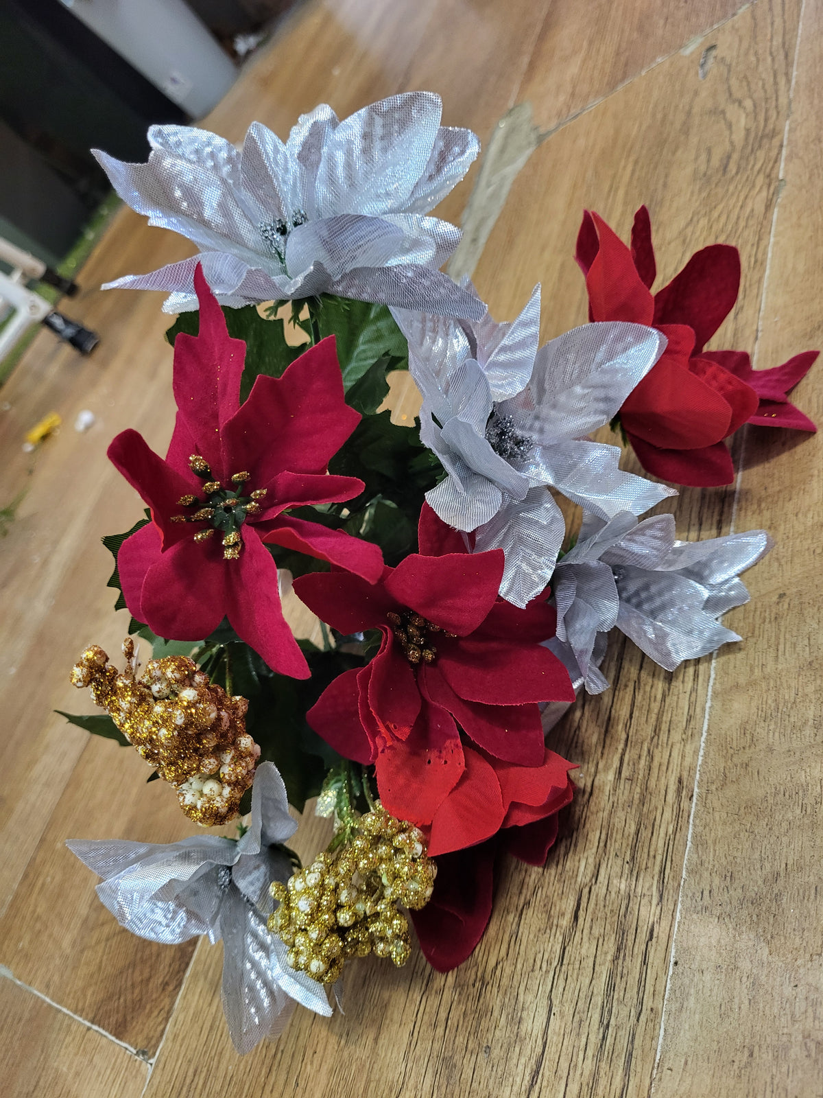 Red and silver poinsettia bunch with gold berries  image 1