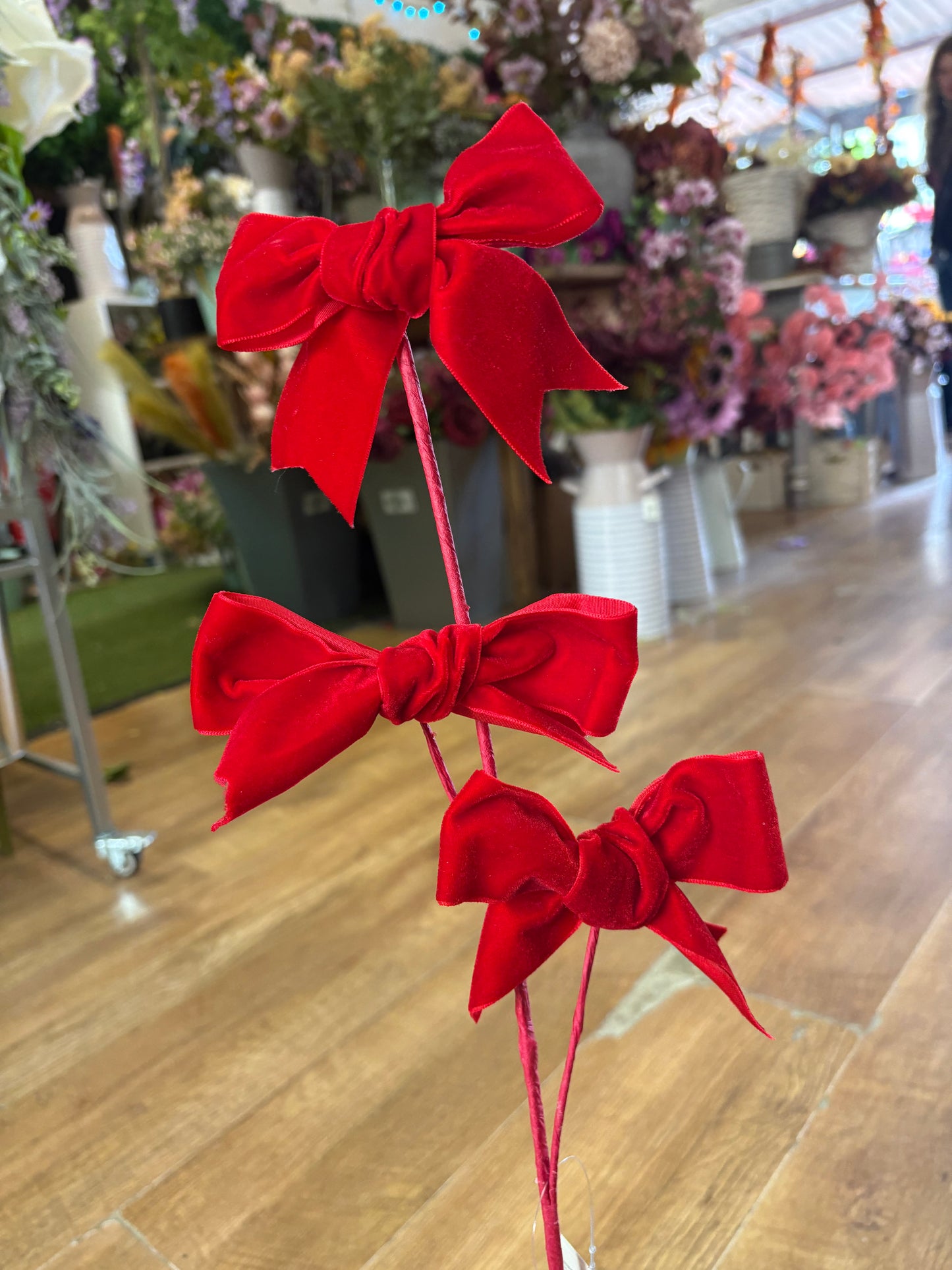 Red velvet bow spray