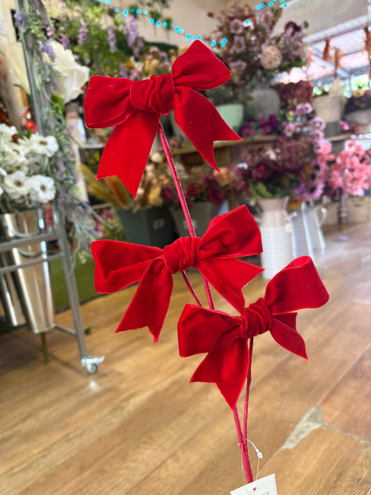 Red velvet bow spray