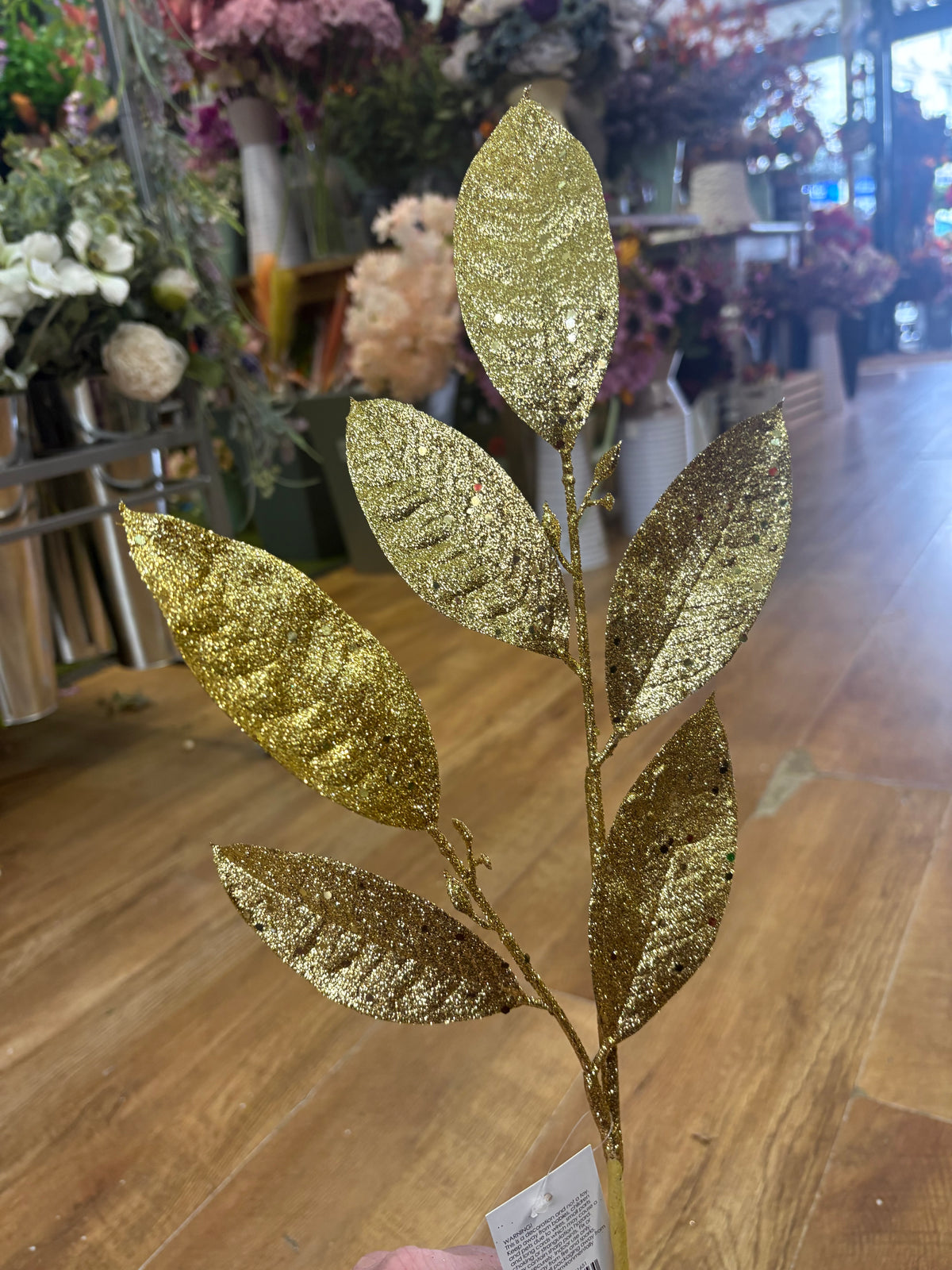 Long stem gold glittered foliage