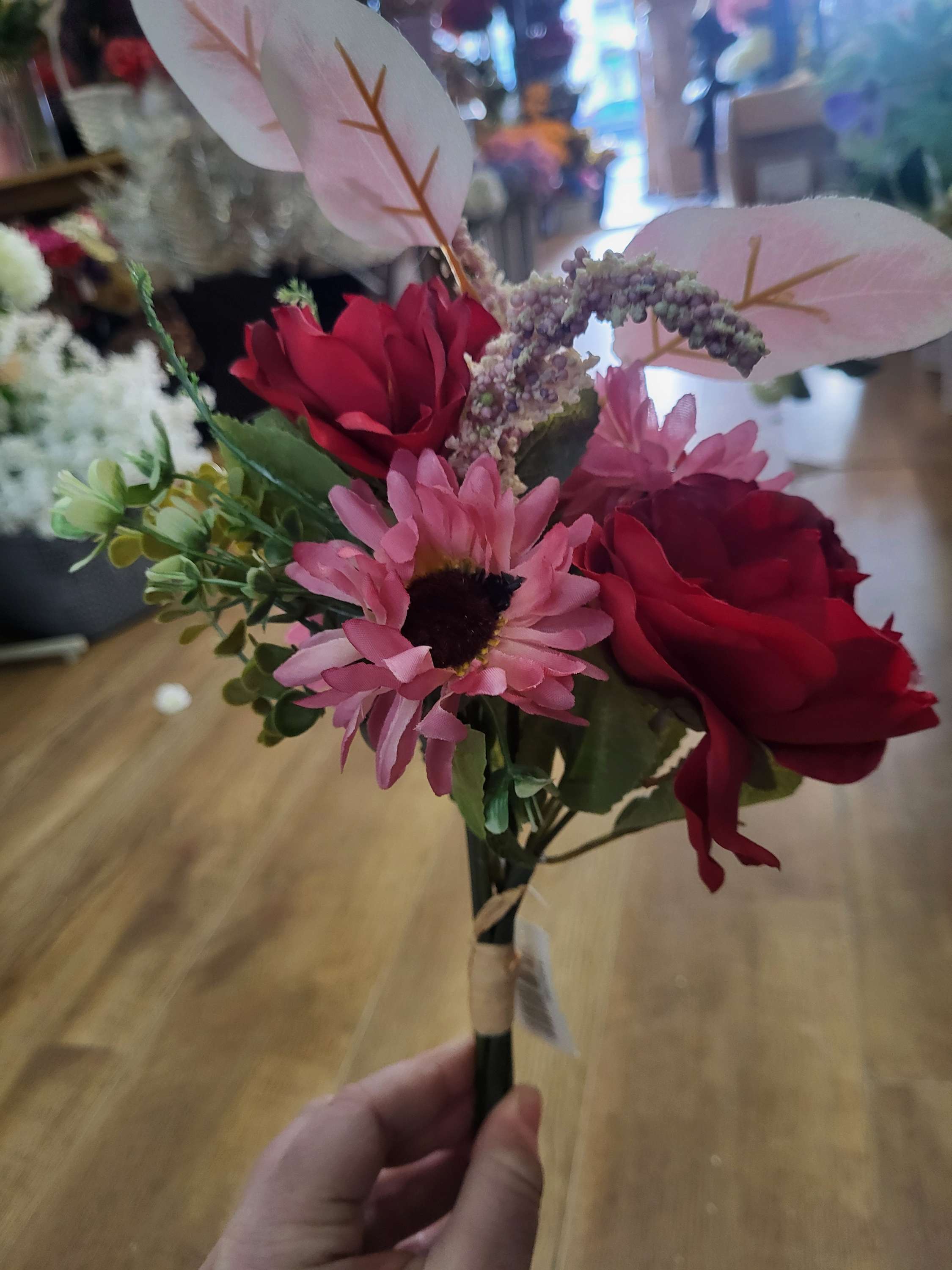 Hand tied red and pink mixed floral/foliage bundle image 5