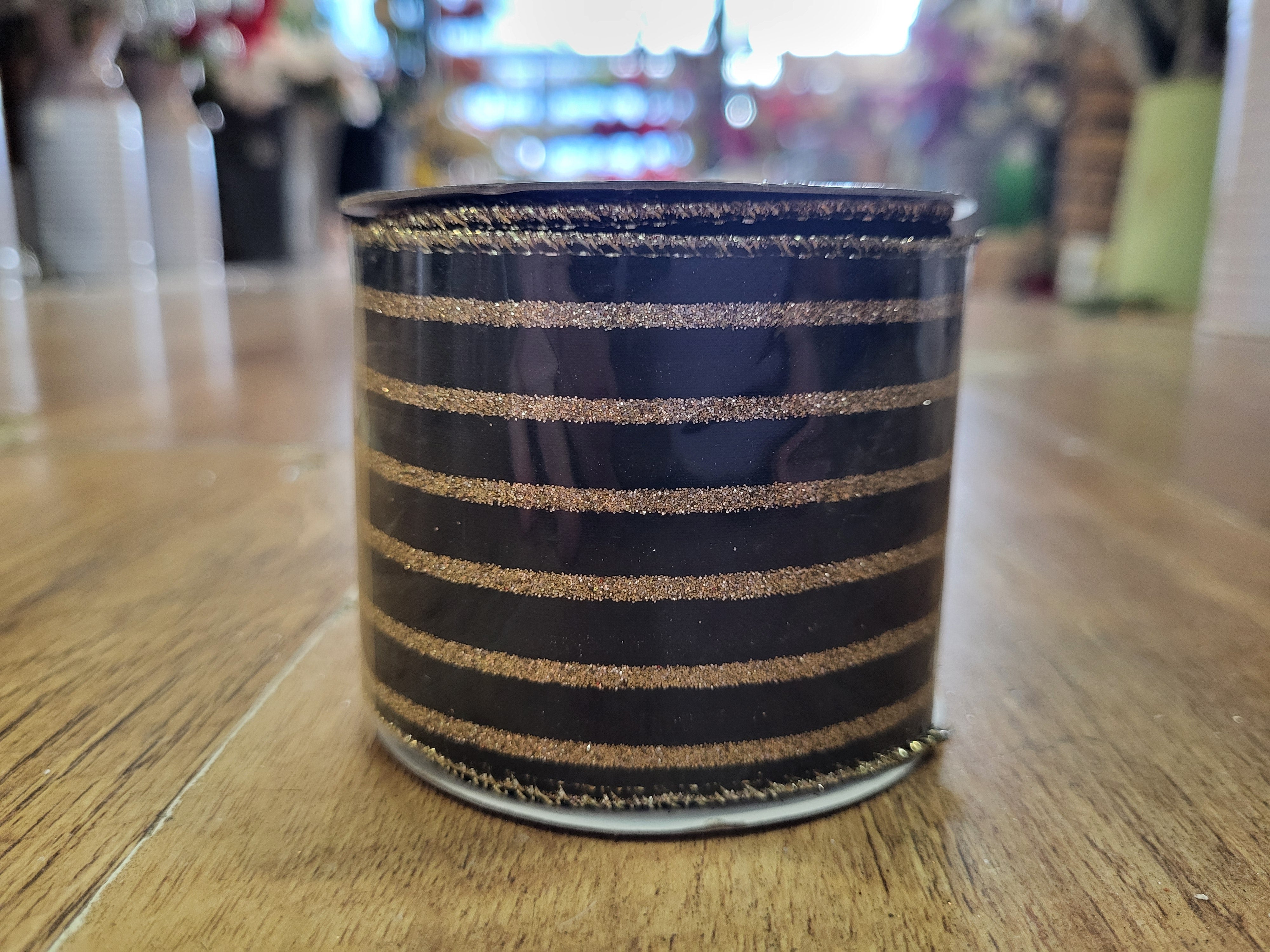 2.7m approx. roll of black with gold glitter striped wired ribbon image 1