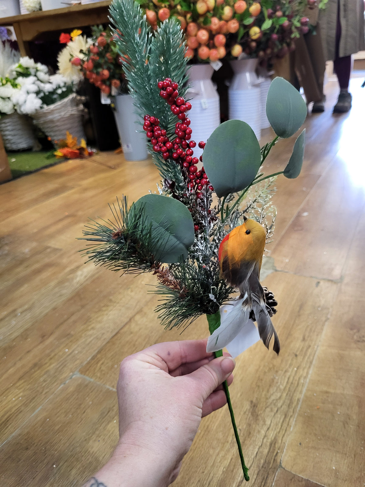 Mixed winter foliage and berry branch with a Robin image 6