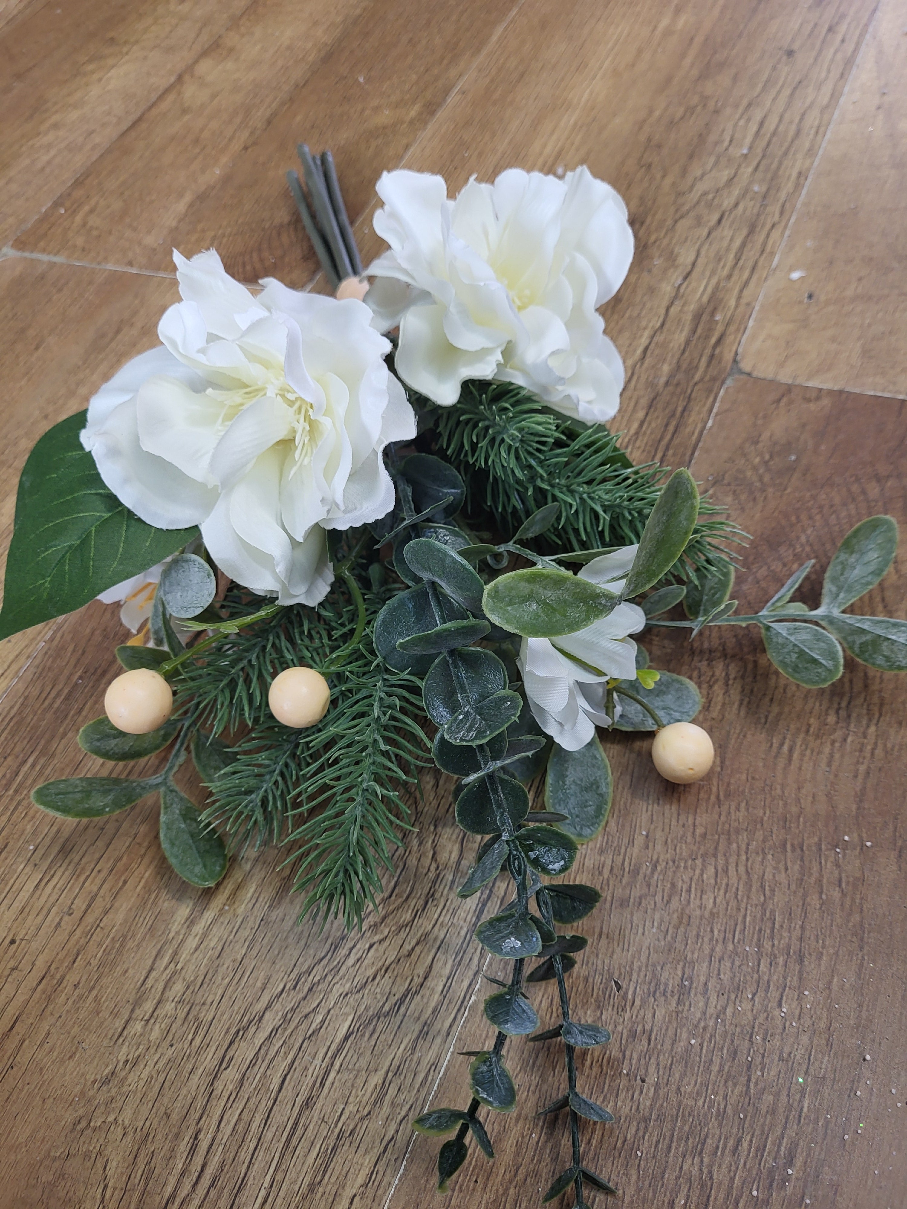 Hand tied winter foliage bundle with ivory flowers and cream berries image 5