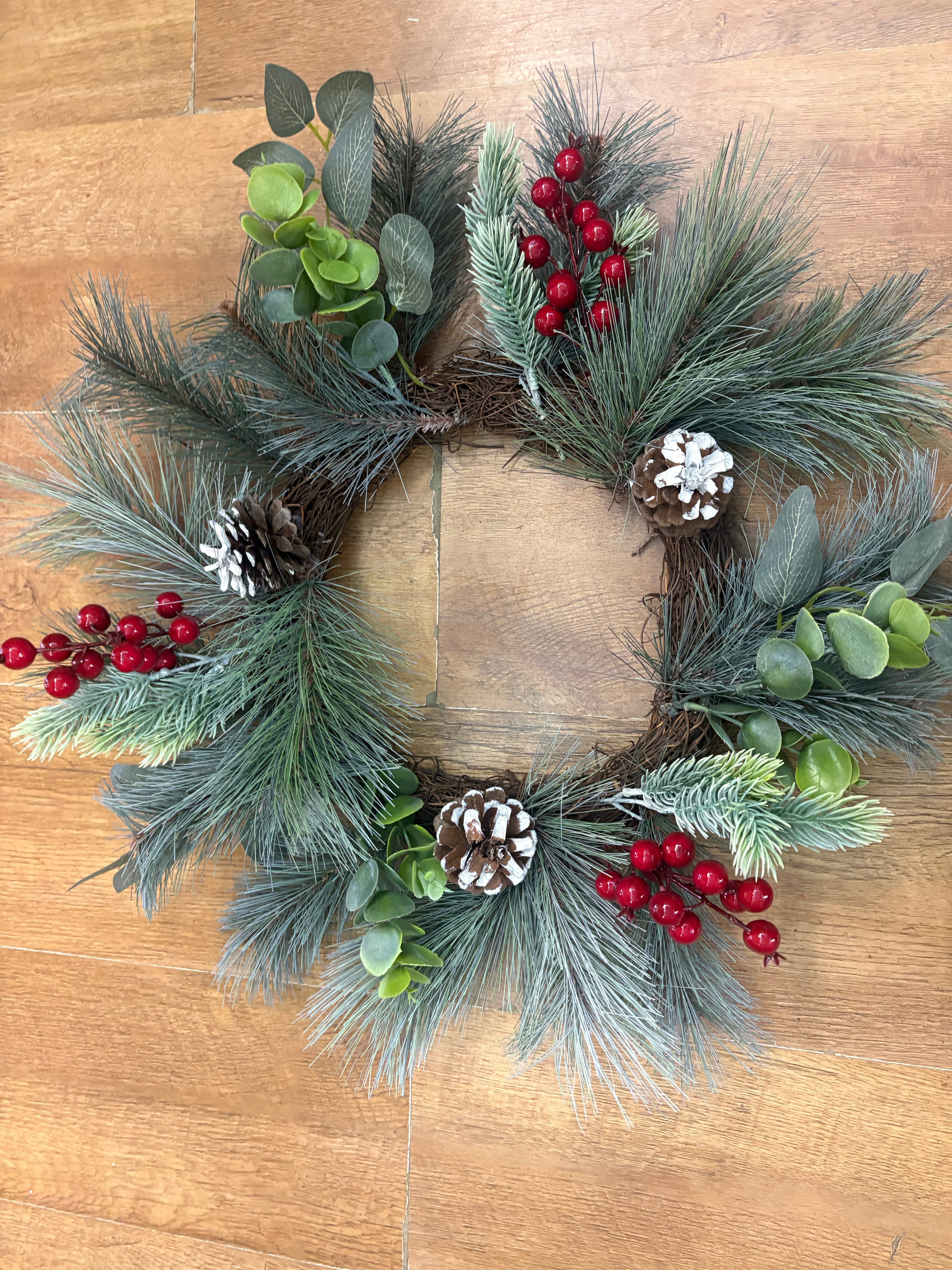 50cm frosted cone and berry wreath (measured tip to tip)