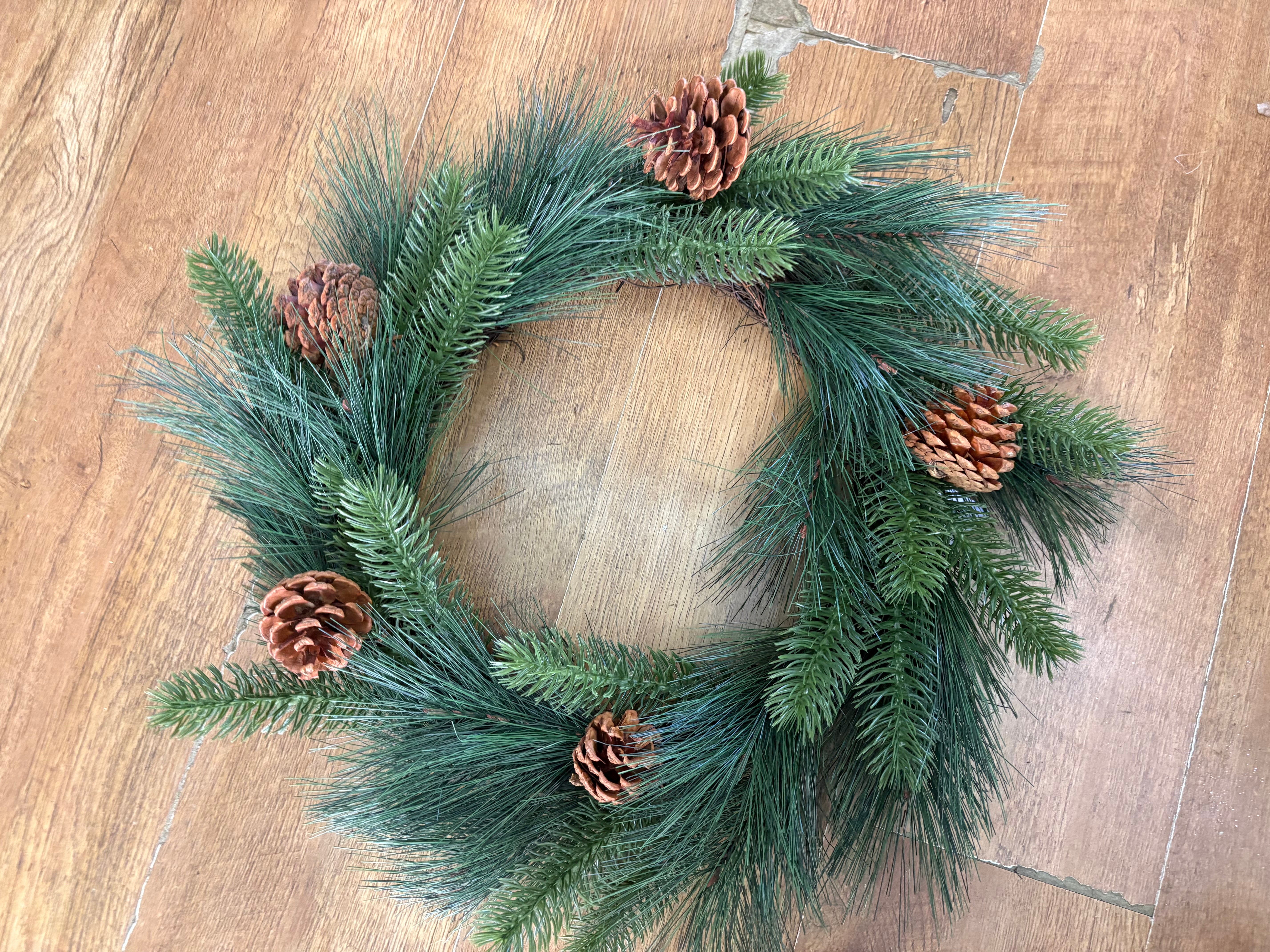 55cm mixed pine and spruce with cones wreath on grapevine base