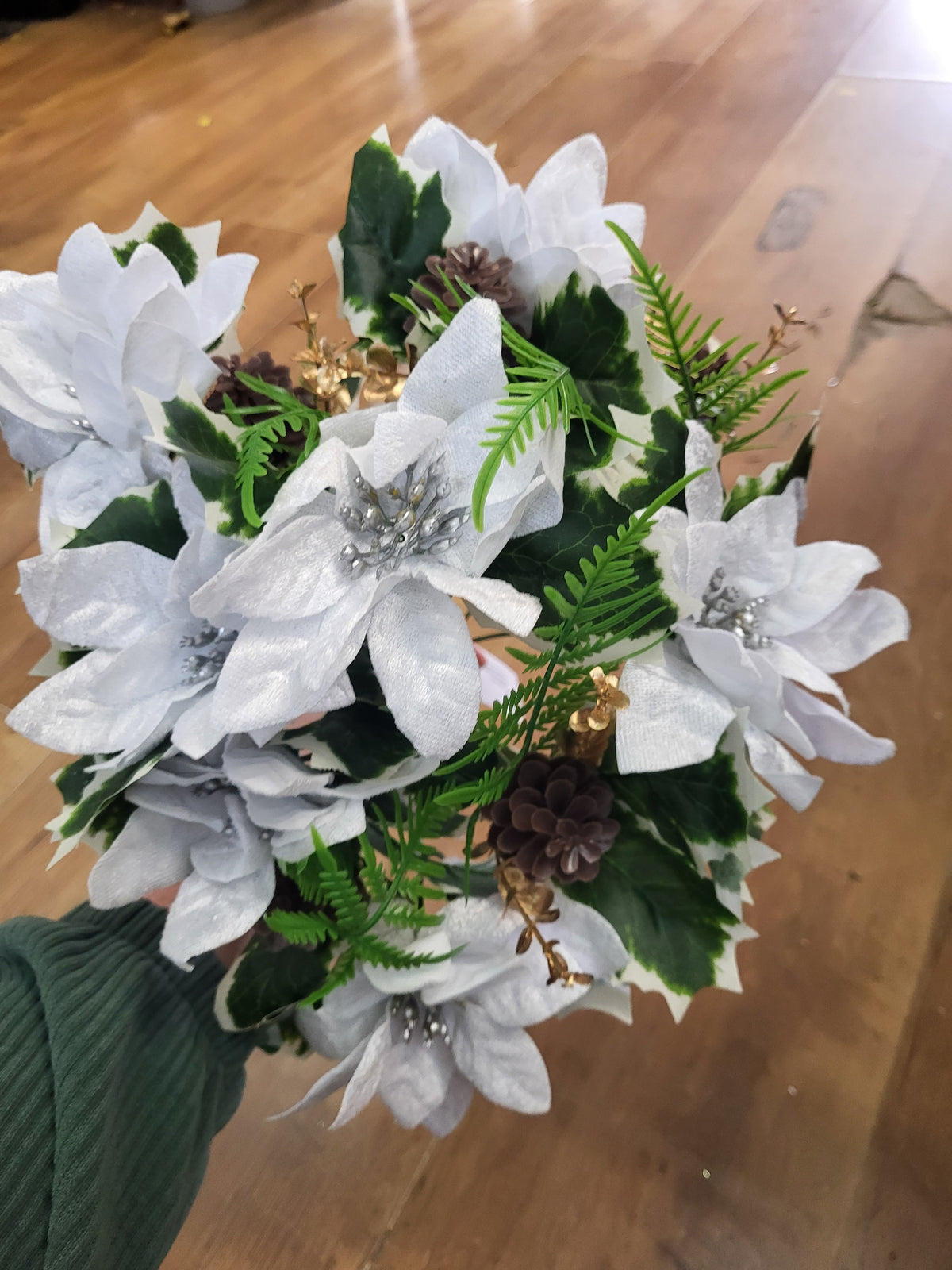 Large white velvet poinsettia and cone bouquet  image 4