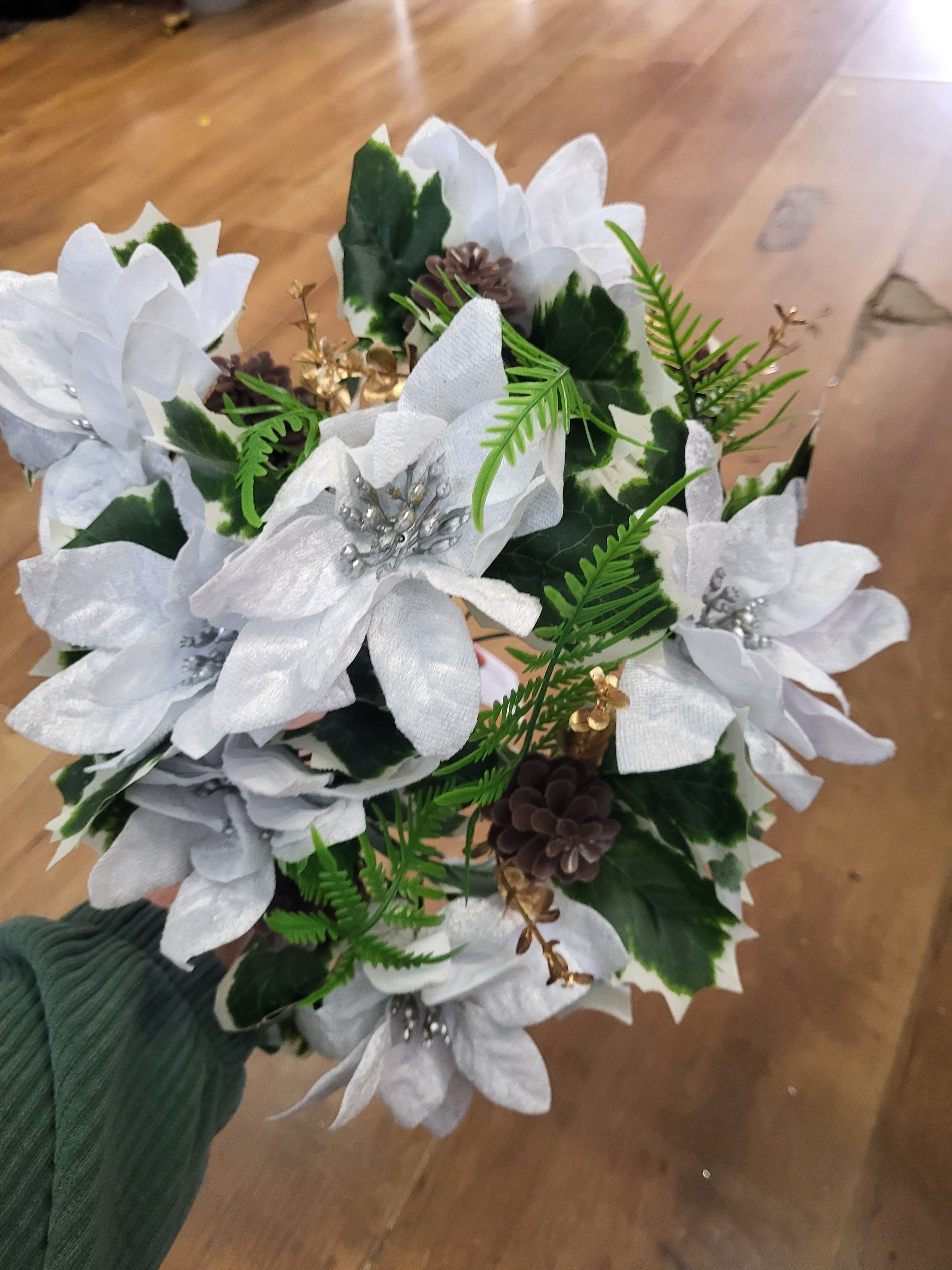 Large white velvet poinsettia and cone bouquet  image 4