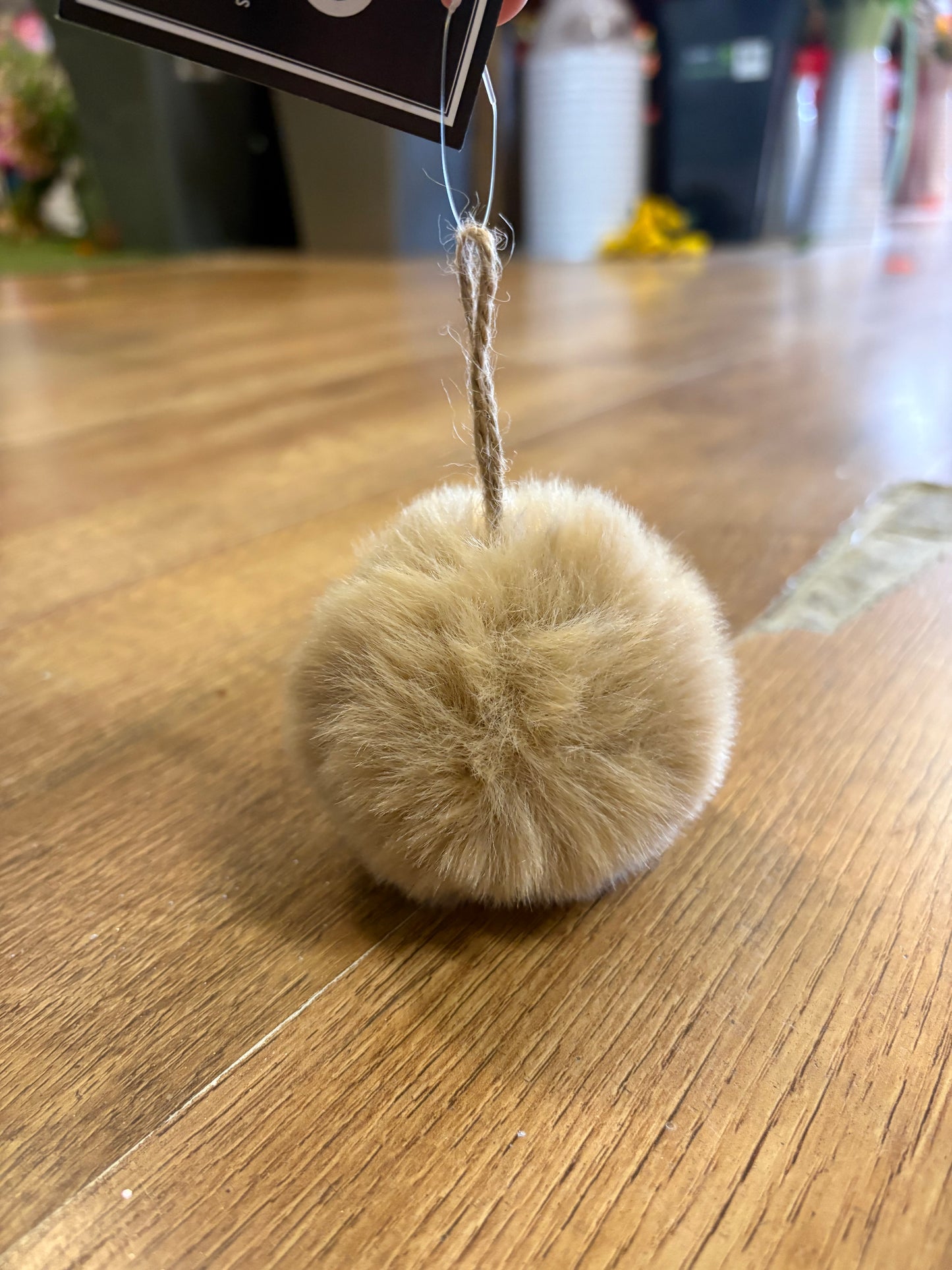 Small beige fluffy bauble