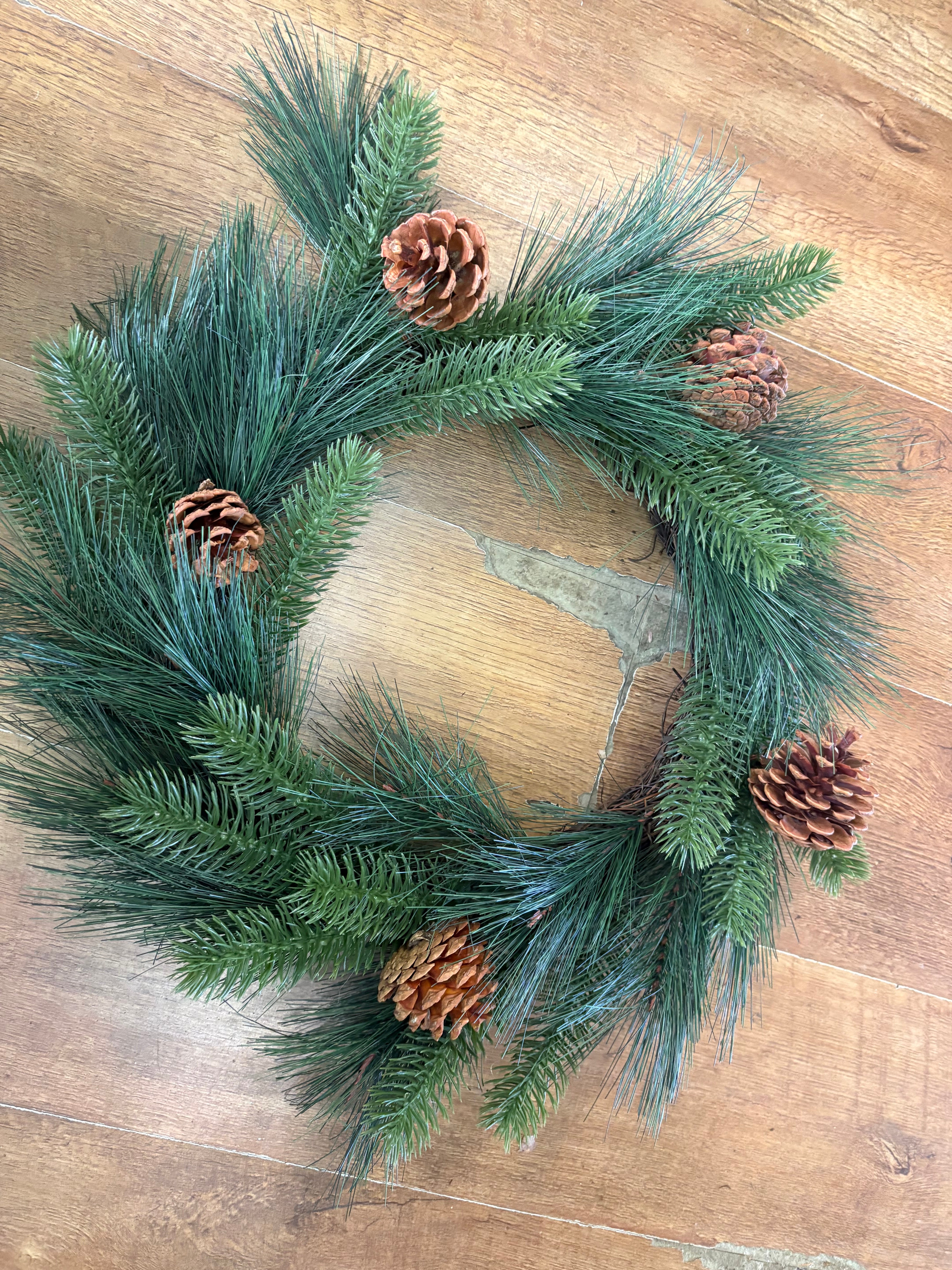 55cm mixed pine and spruce with cones wreath on grapevine base