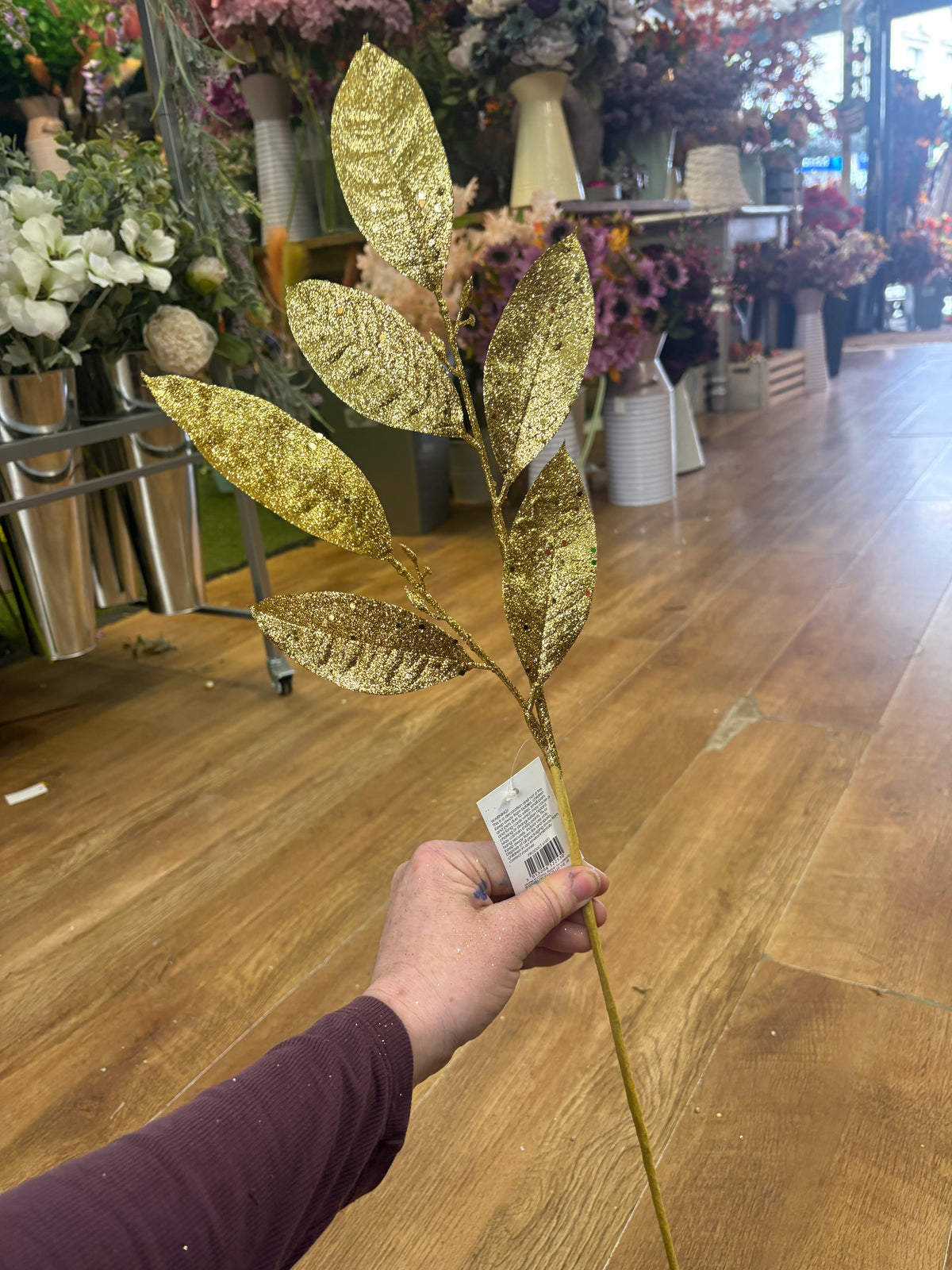 Long stem gold glittered foliage